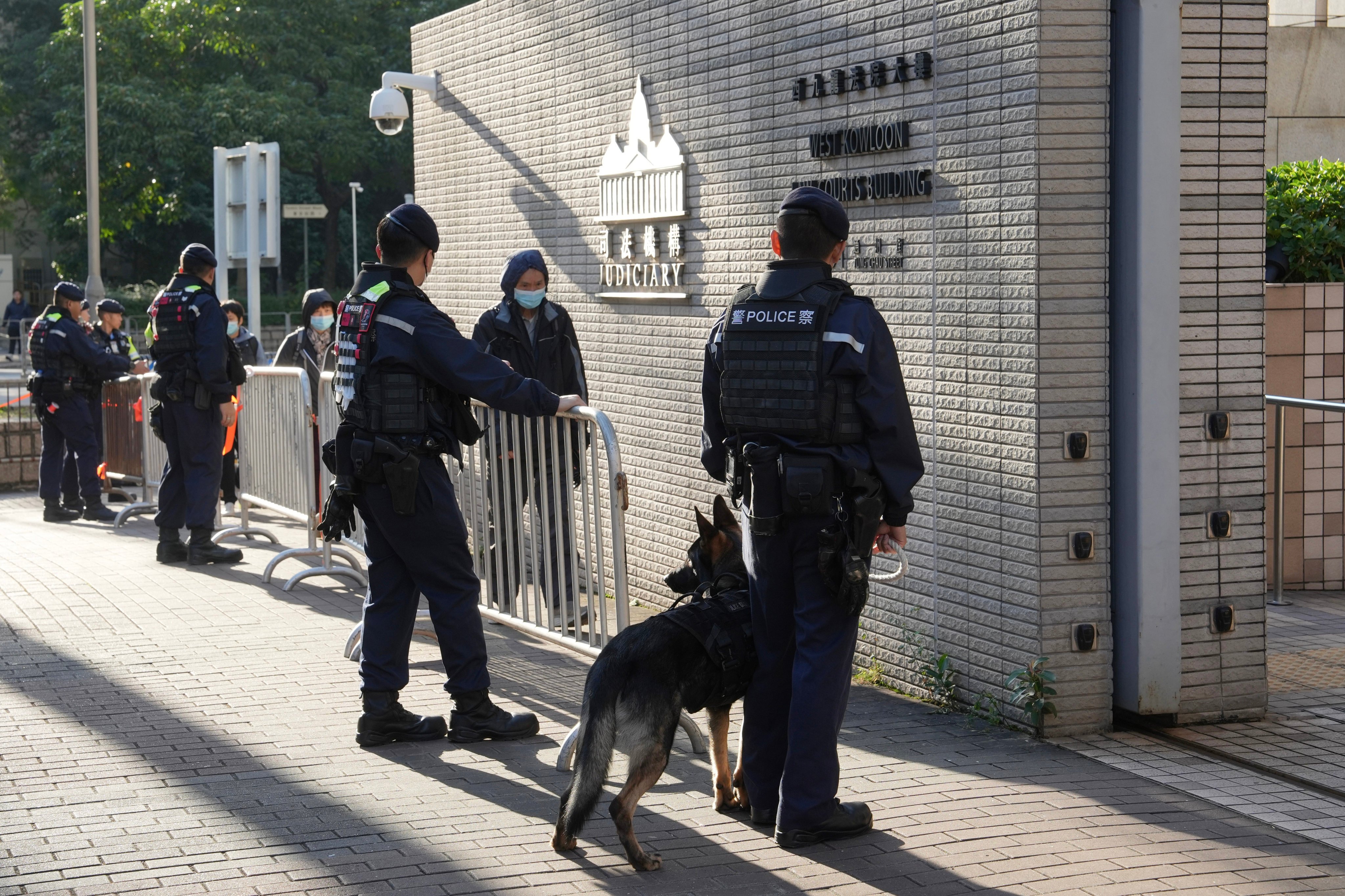 Police have been on alert outside West Kowloon Court. Photo: Sun Yeung