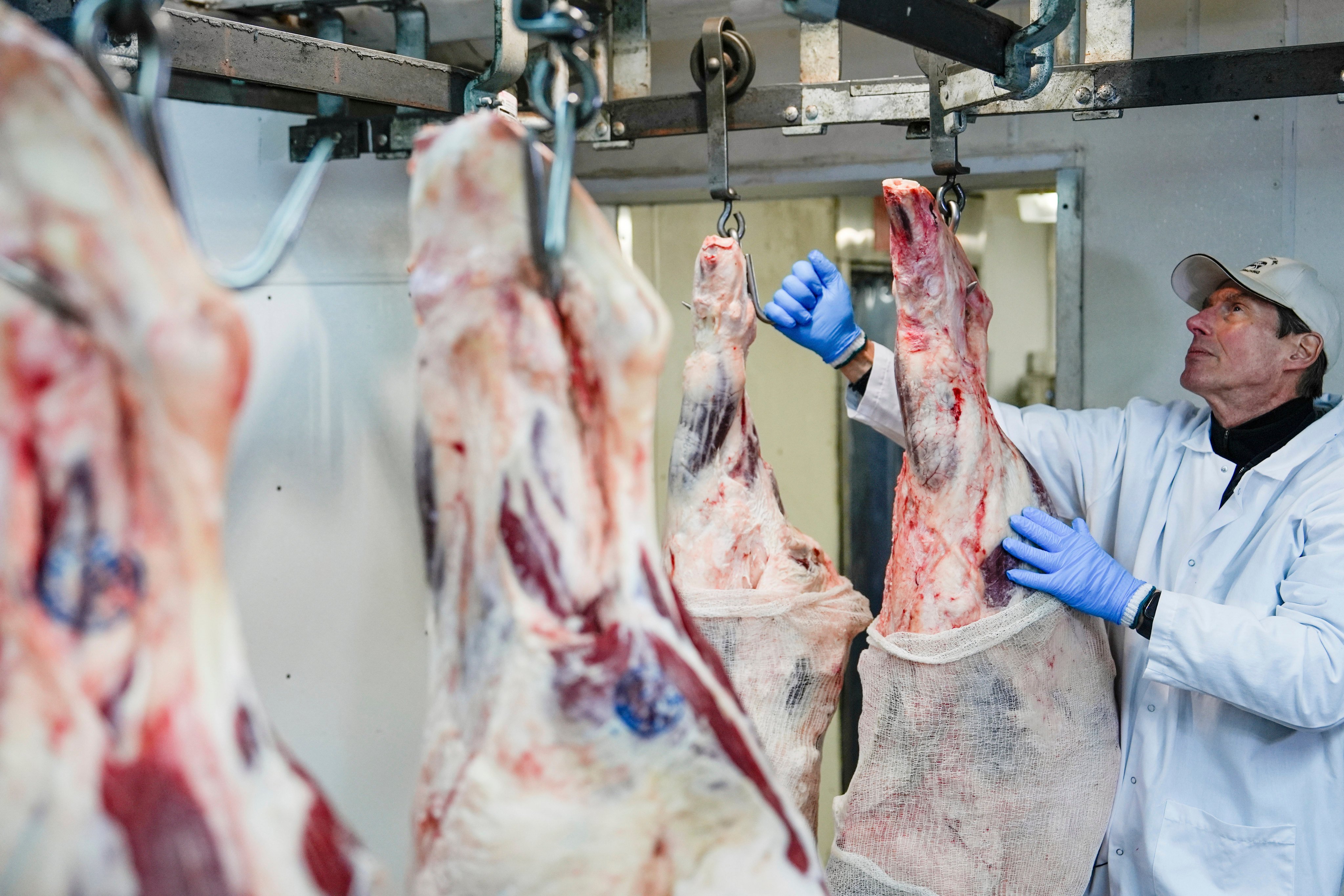 John Jobbagy shows cuts of beef in his company’s meat locker in the Meatpacking District of Manhattan, New York. Photo: AP