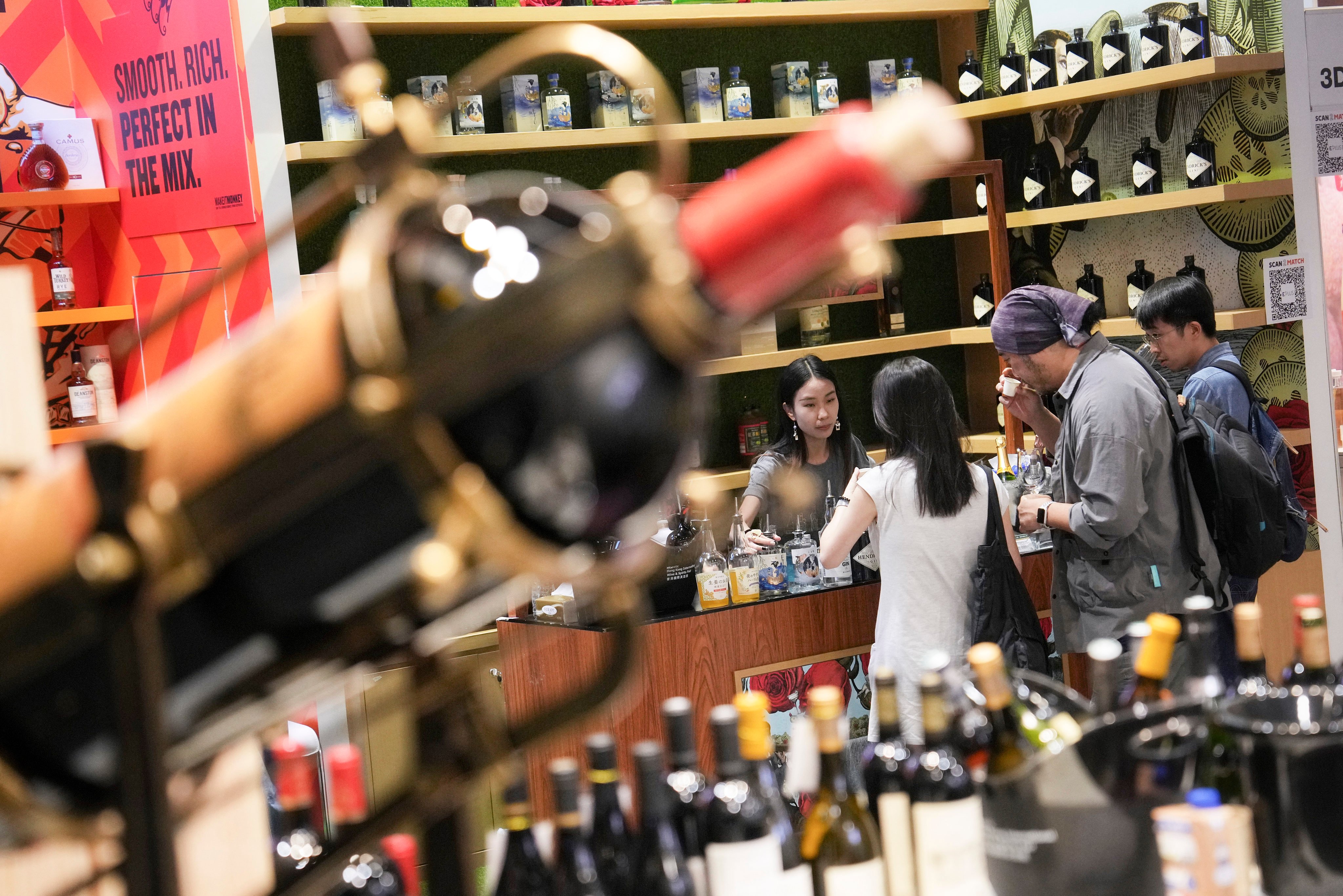 A wine tasting session at a booth of the Hong Kong International Wine and Spirits Fair in November. Photo: Elson Li