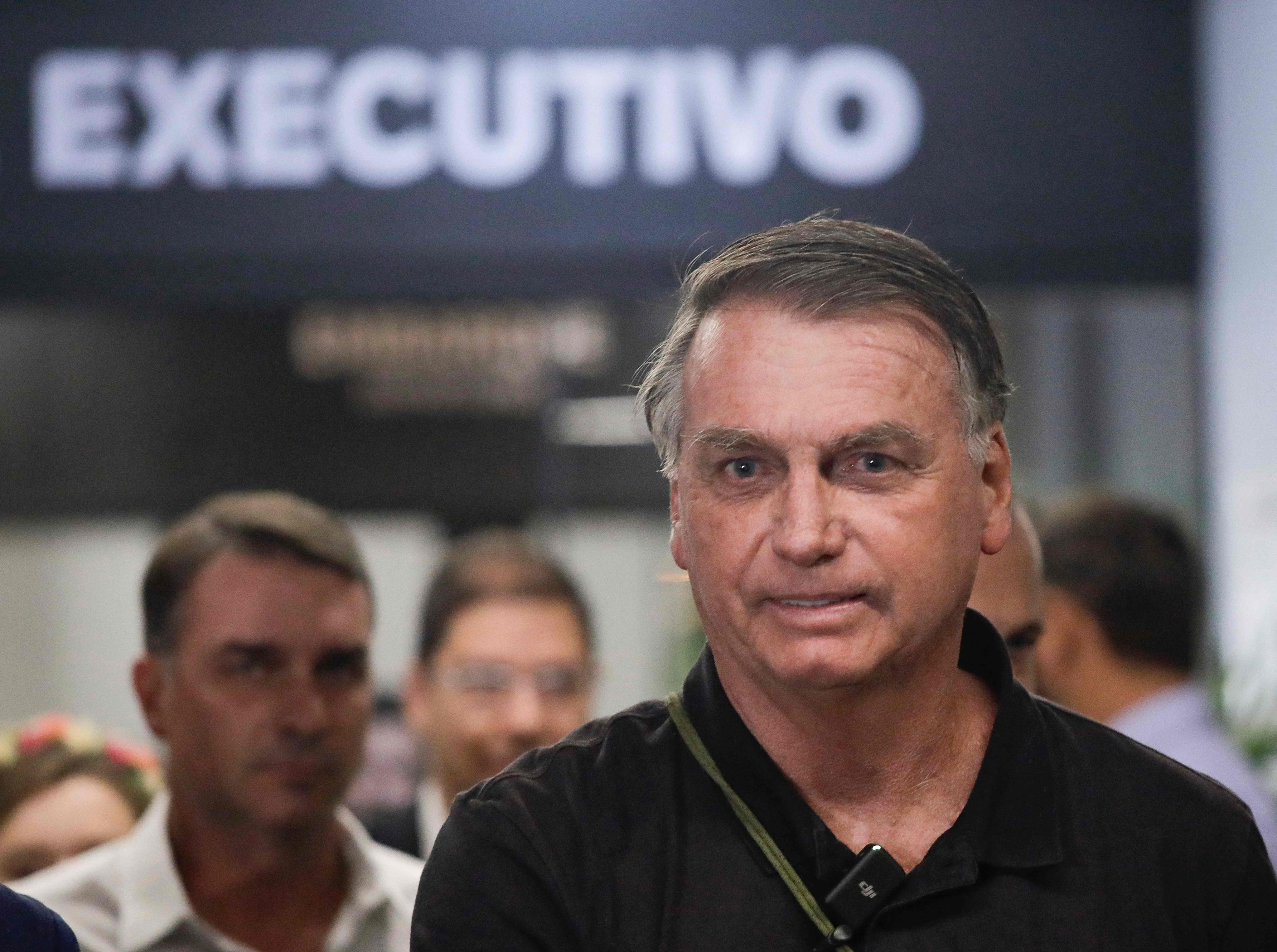 Brazil’s former President Jair Bolsonaro arrives at the airport in Brasilia on Monday. Photo: AFP