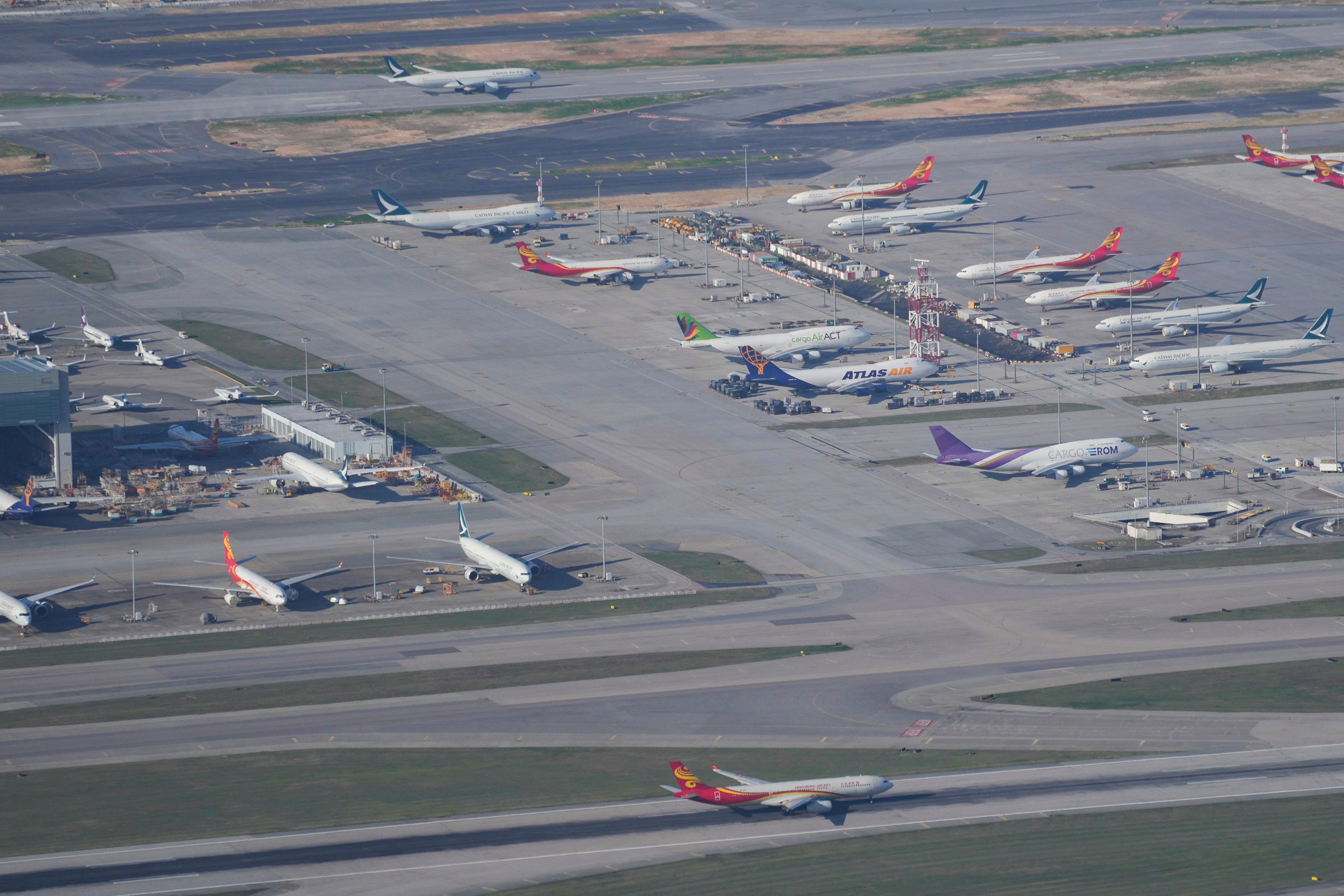 Three planes have inaugurated the new runway system. Photo: Elson Li