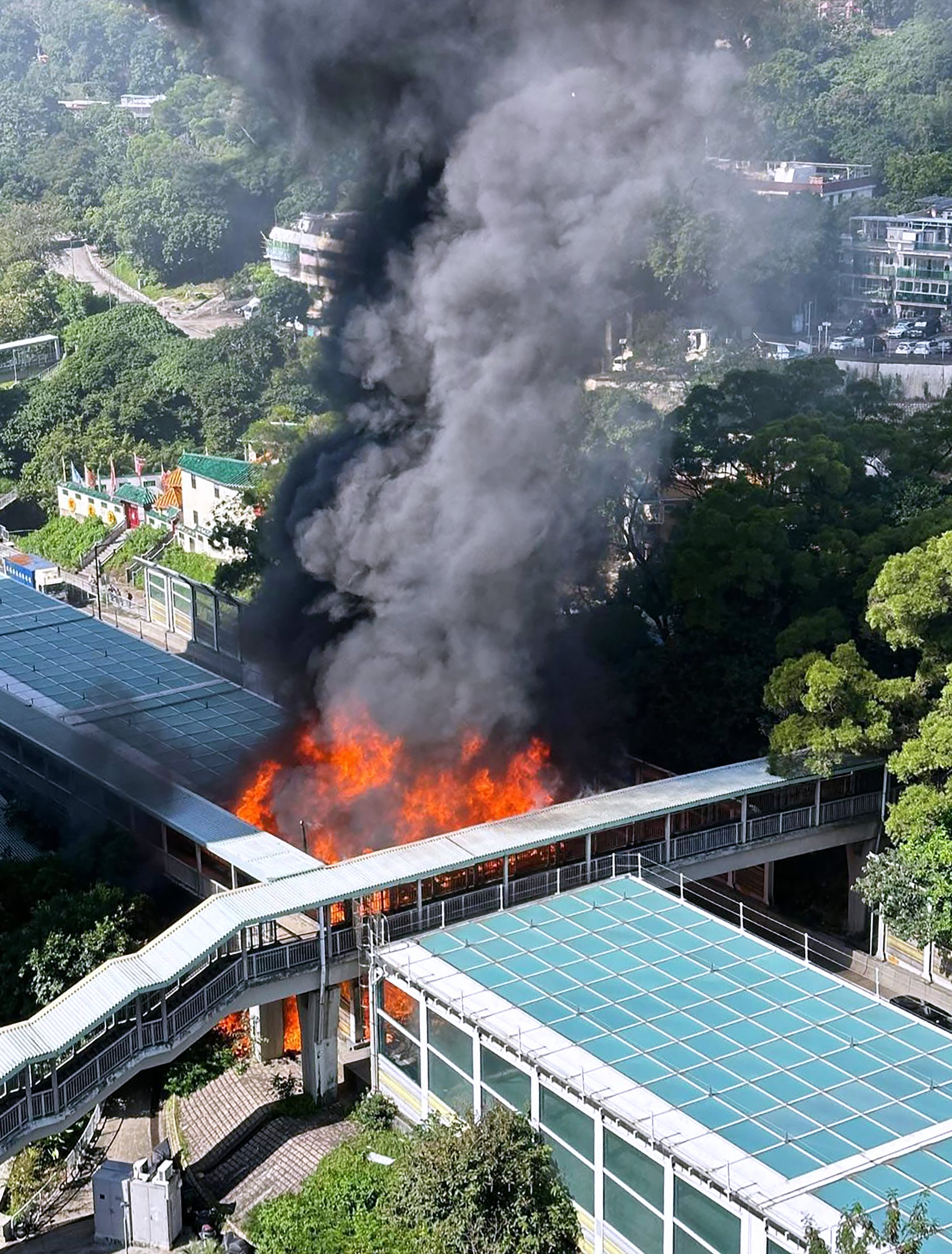 Fire engulfs part of the noise barrier along Cheung Pei Shan Road near Shek Wai Kok Estate, Tsuen Wan. Photo: Handout