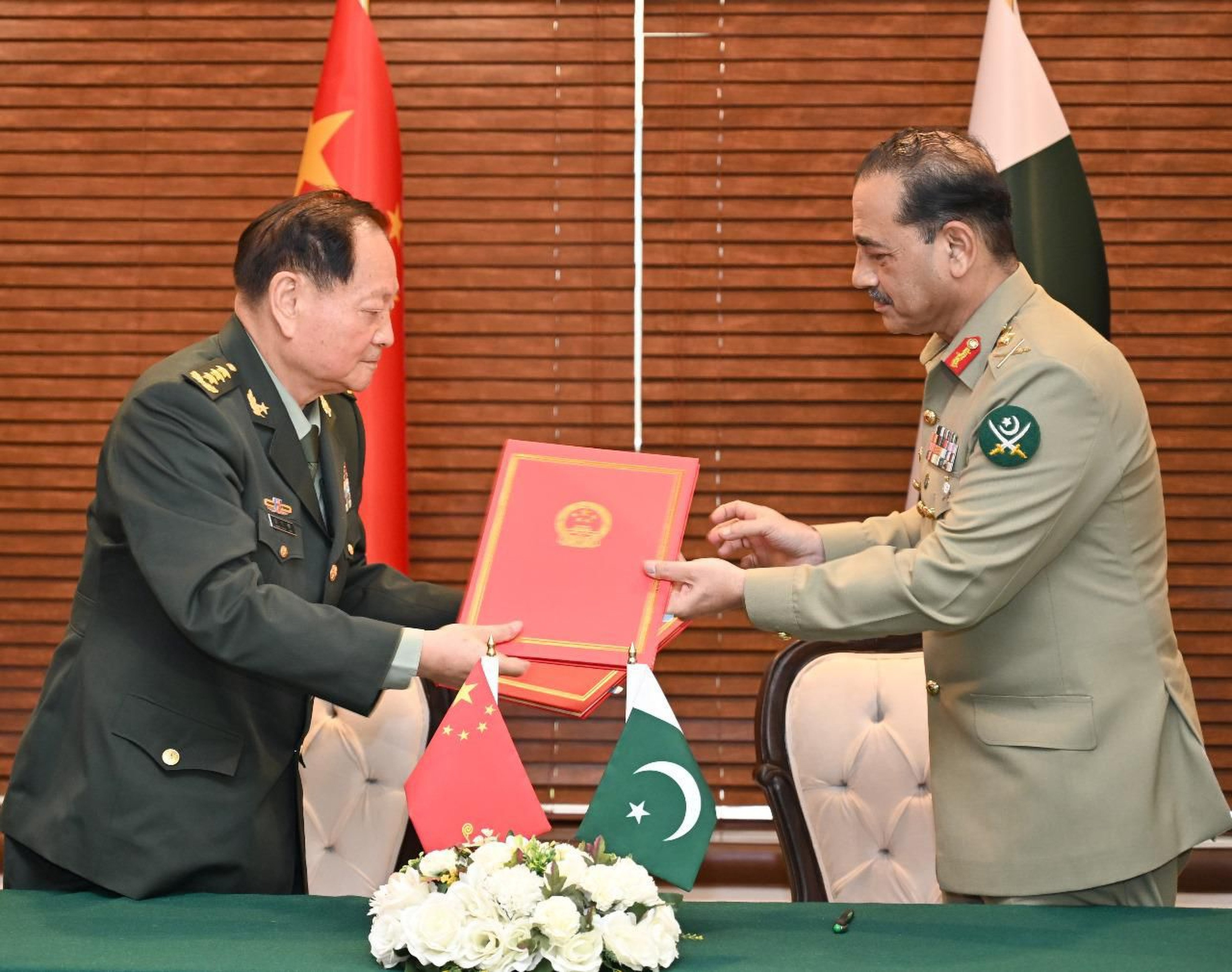 Zhang Youxia (left), vice-chairman of China’s Central Military Commission, meets his Pakistani counterpart Syed Asim Munir during a visit to Pakistan this week. Photo: Handout