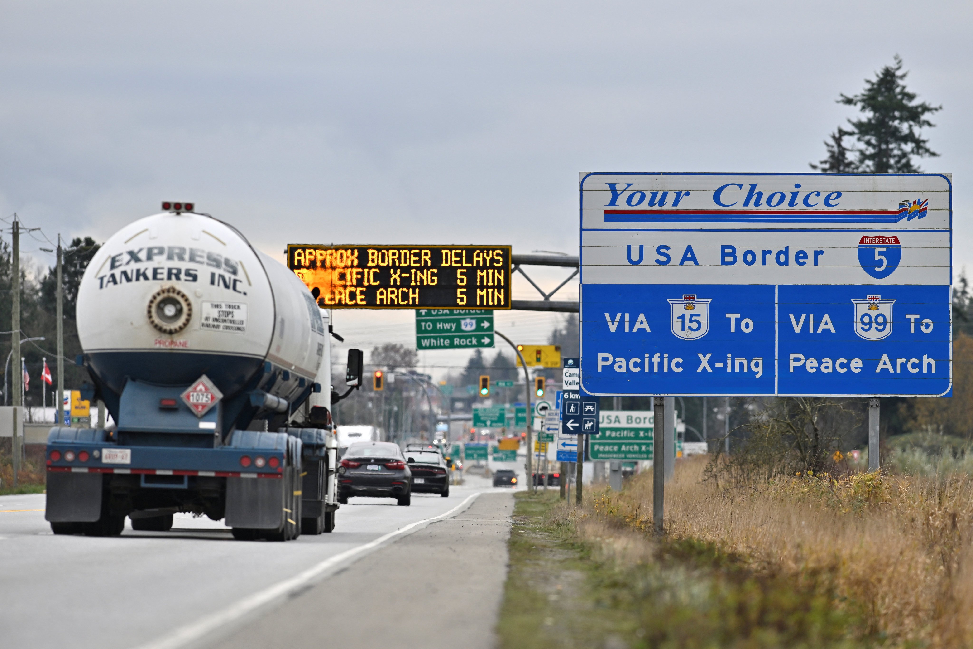 Commercial trucks head towards the US Customs and Border Protection Pacific Highway Port of Entry from south Surrey, British Columbia, Canada, on Wednesday. Photo: Reuters