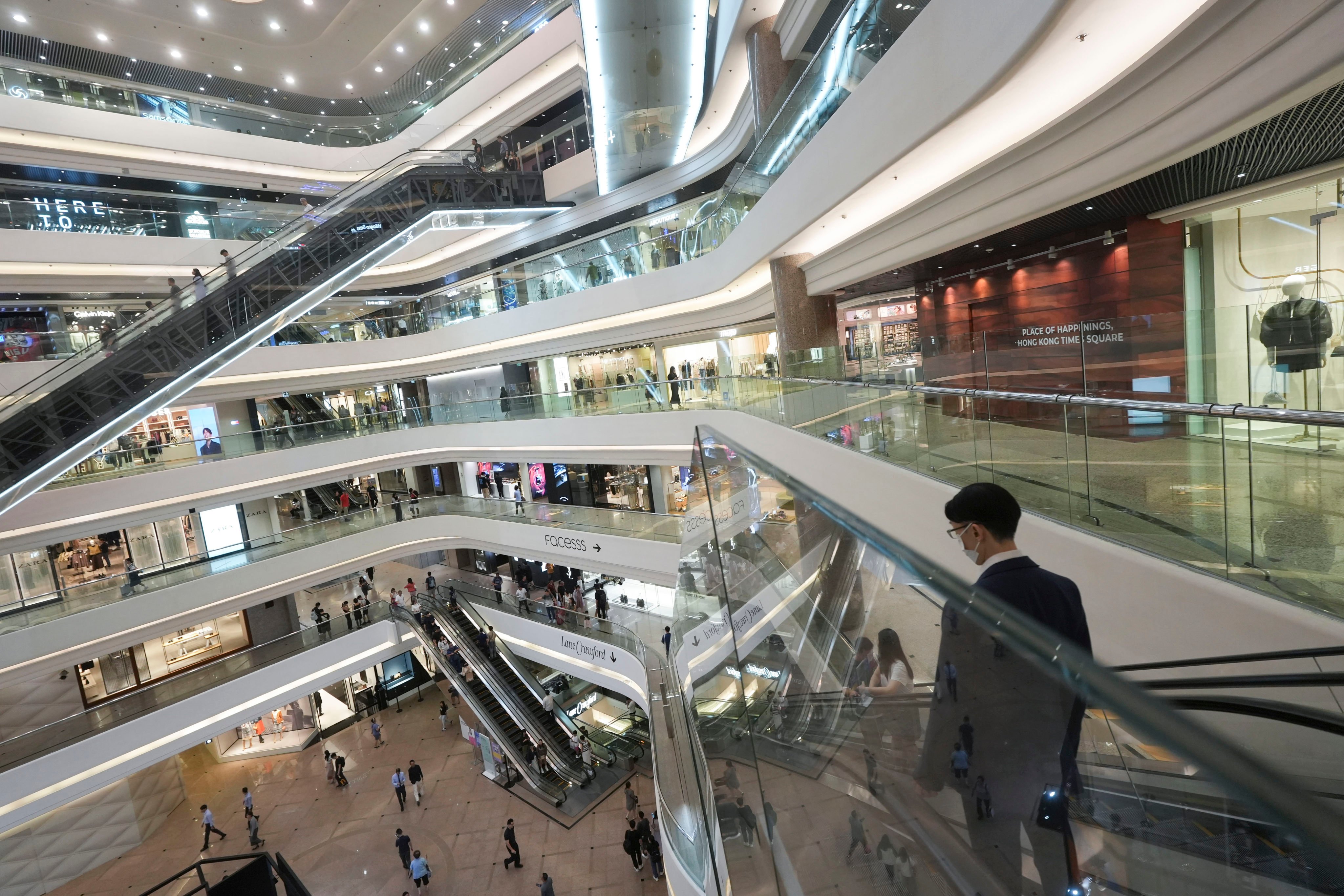 Shoppers visit Times Square shopping mall in Causeway Bay. Hong Kong’s retail sales declined for a seventh consecutive month as the trend of residents heading across the border to spend continued to hit domestic consumption. Photo: Sun Yeung