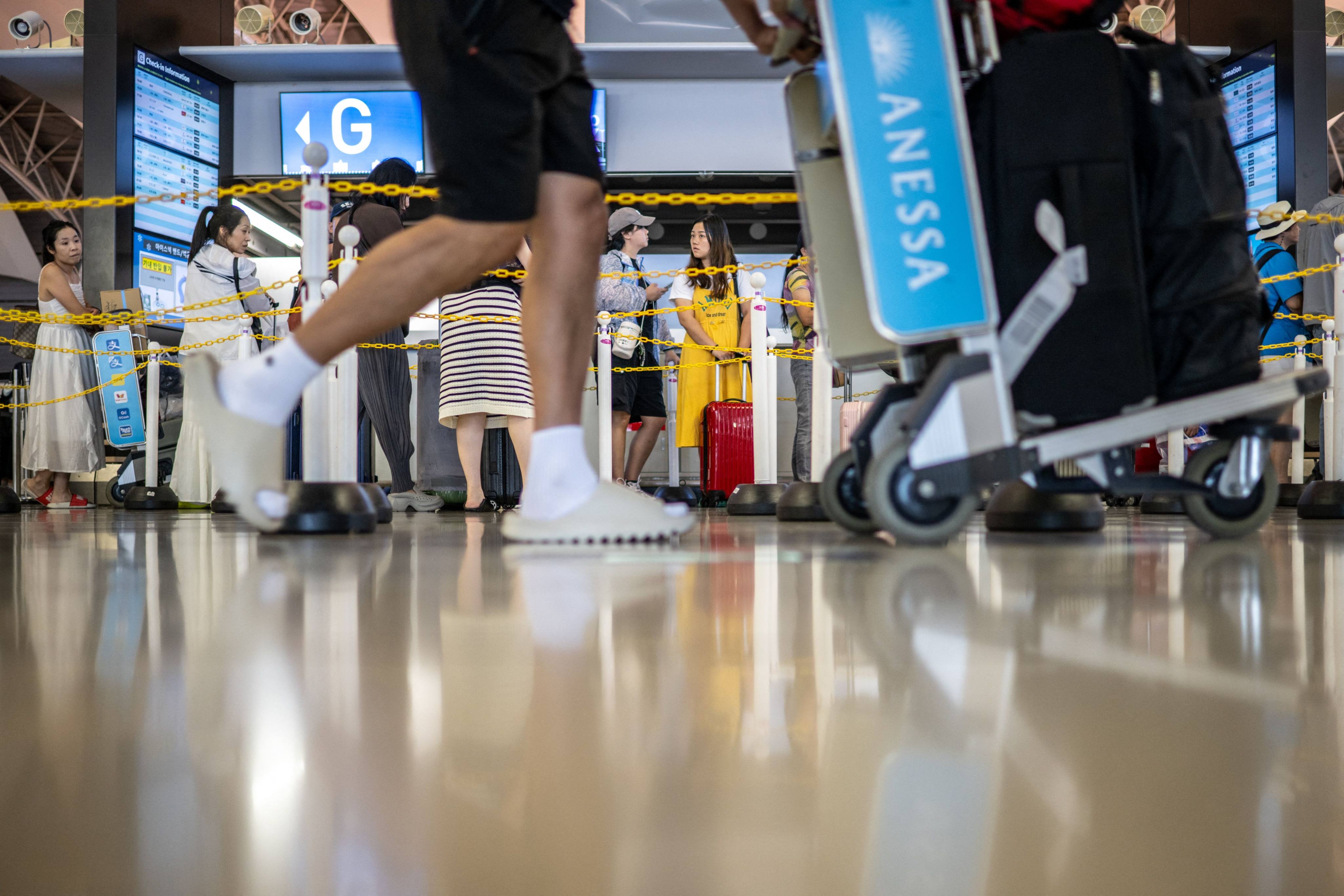 The departure hall at Kansai International Airport in Osaka prefecture. Kyodo News cited sources on Wednesday as saying the country planned to revise its duty-free rules for foreign visitors from the “latter half of the fiscal 2026”. Photo: AFP