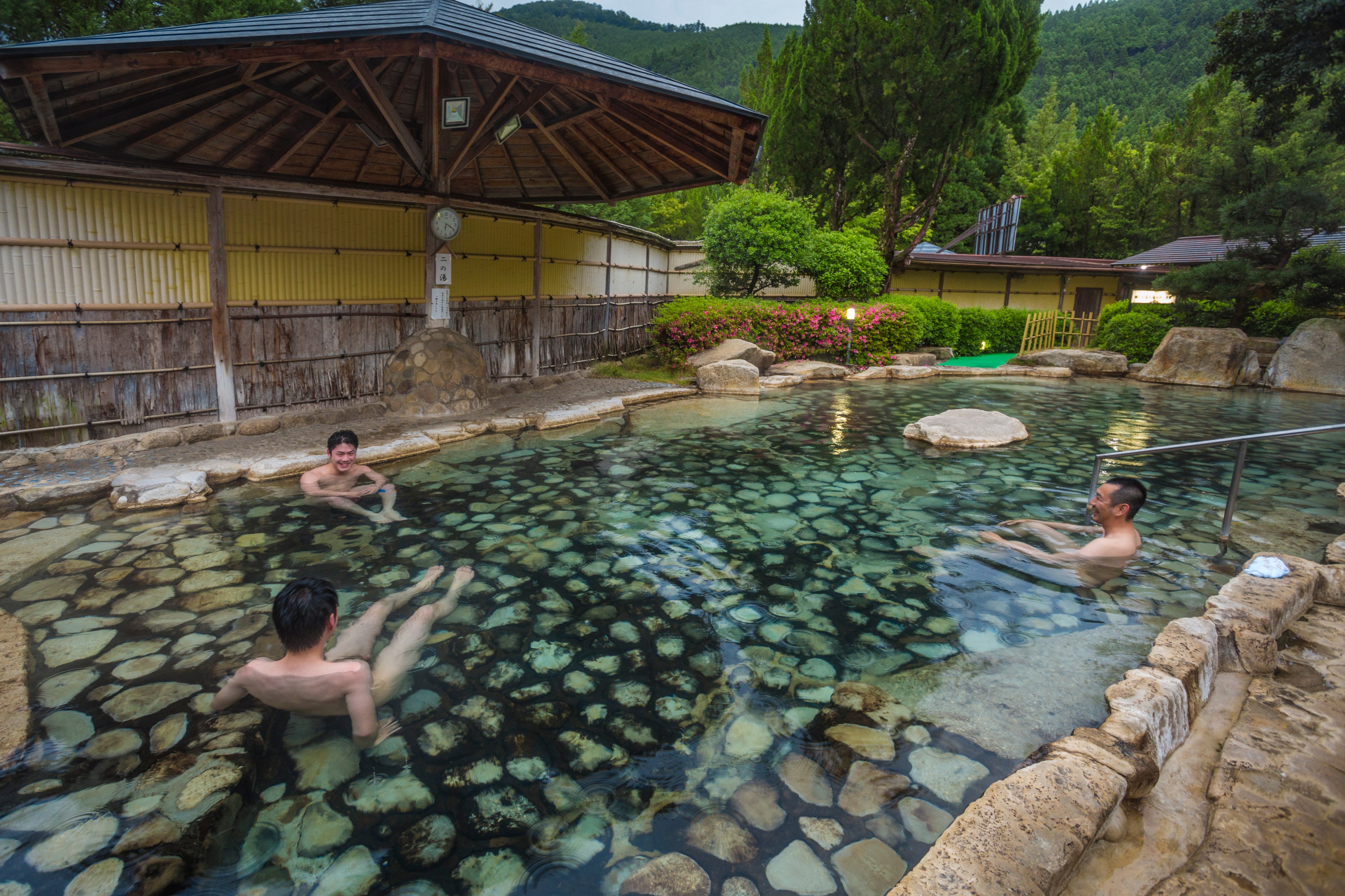 People enjoy the onsen in Japan’s Wakayama prefecture. Photo: Universal Images Group via Getty Images