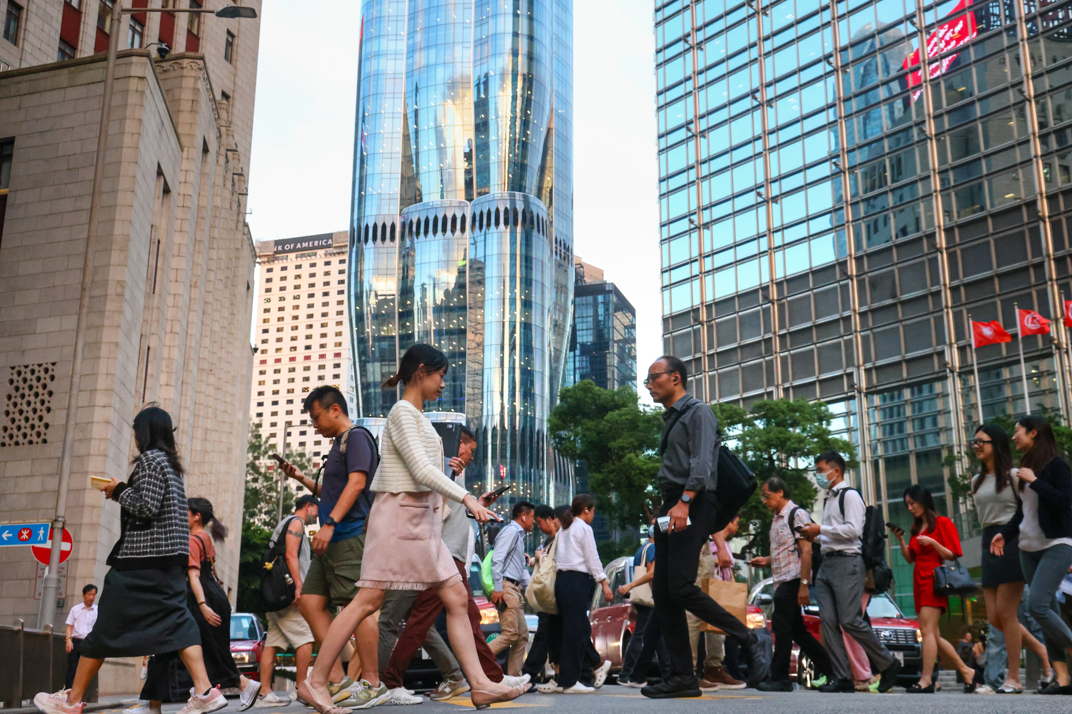 People cross a street in Central on October 4, 2024. Photo: Dickson Lee