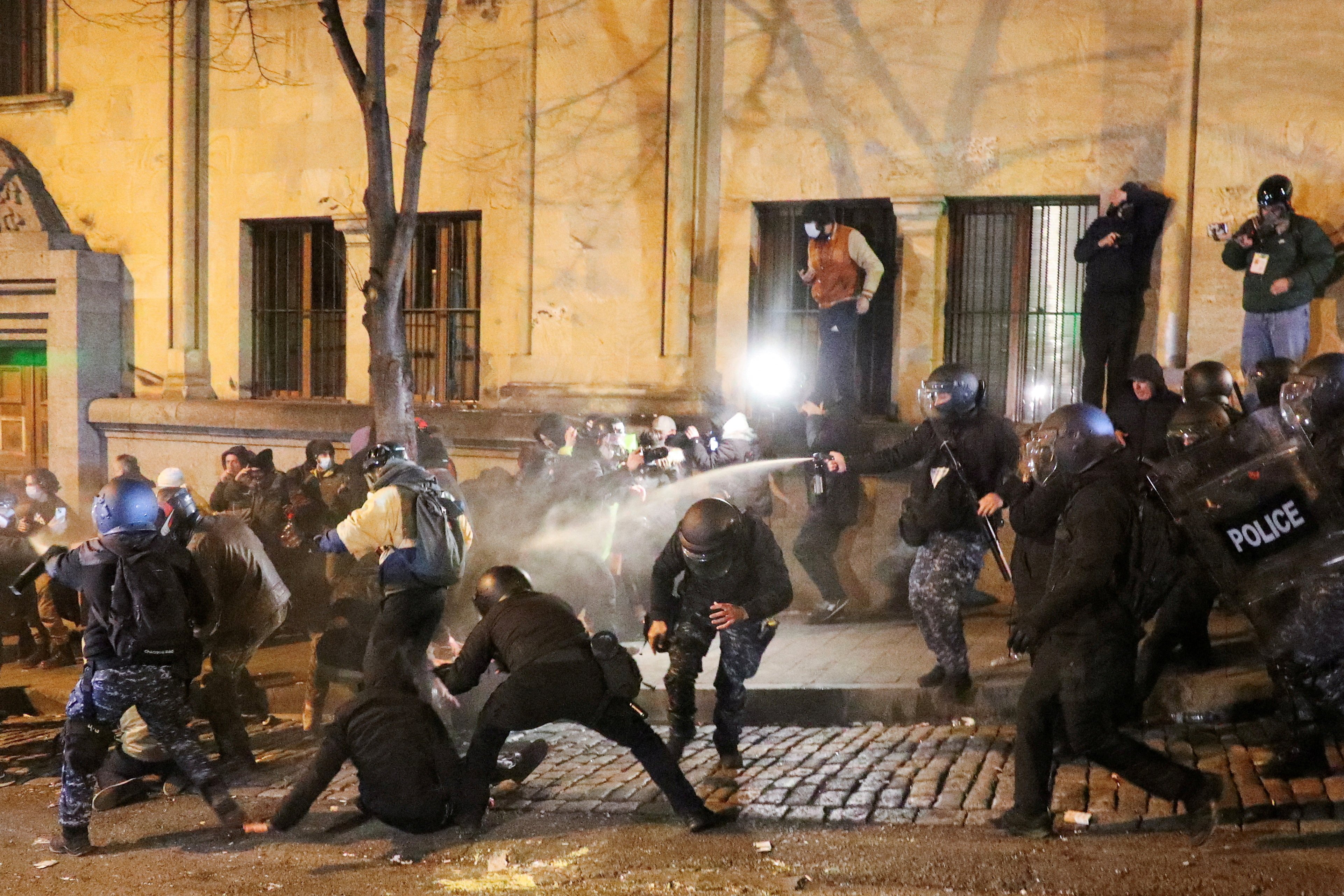 Protesters clash with Georgian police in Tblisi over the government’s EU application delay. Photo: Reuters