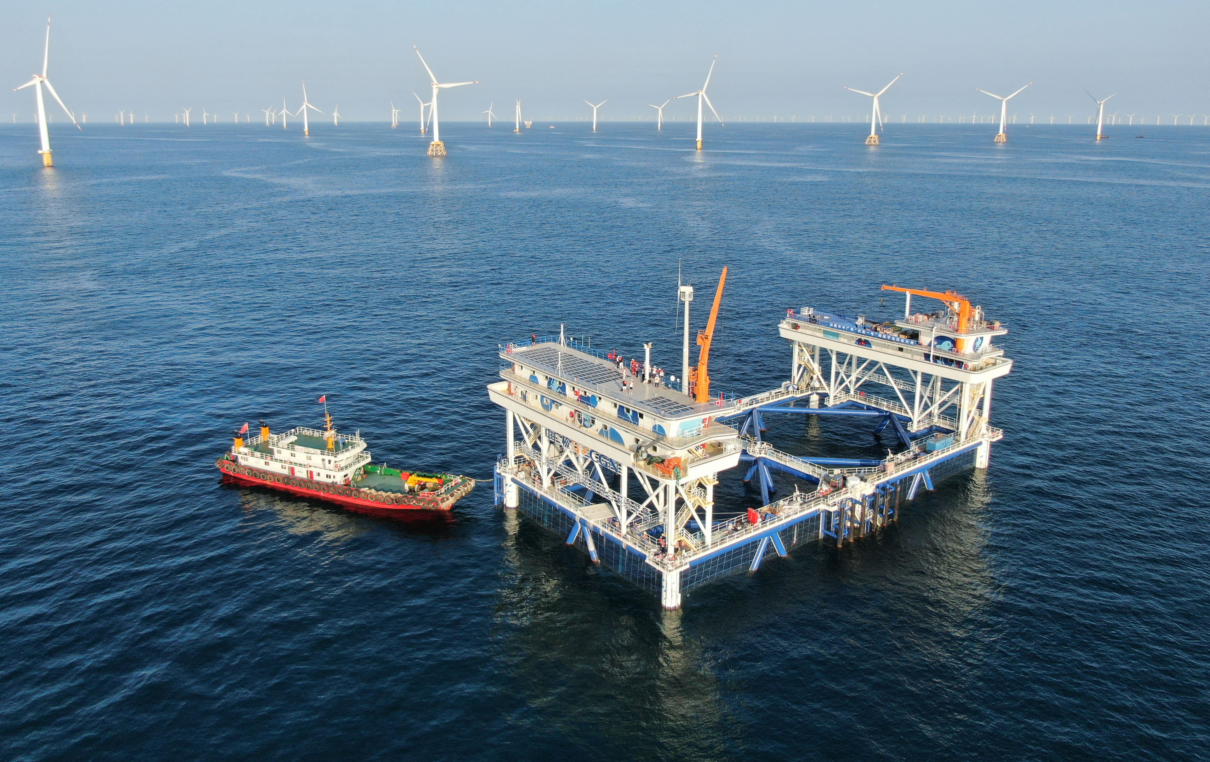 China General Nuclear Power Group announced it will lead a tech consortium to build a man-made island connected to offshore wind turbines to generate, store and use renewable energy. Photo: Xinhua