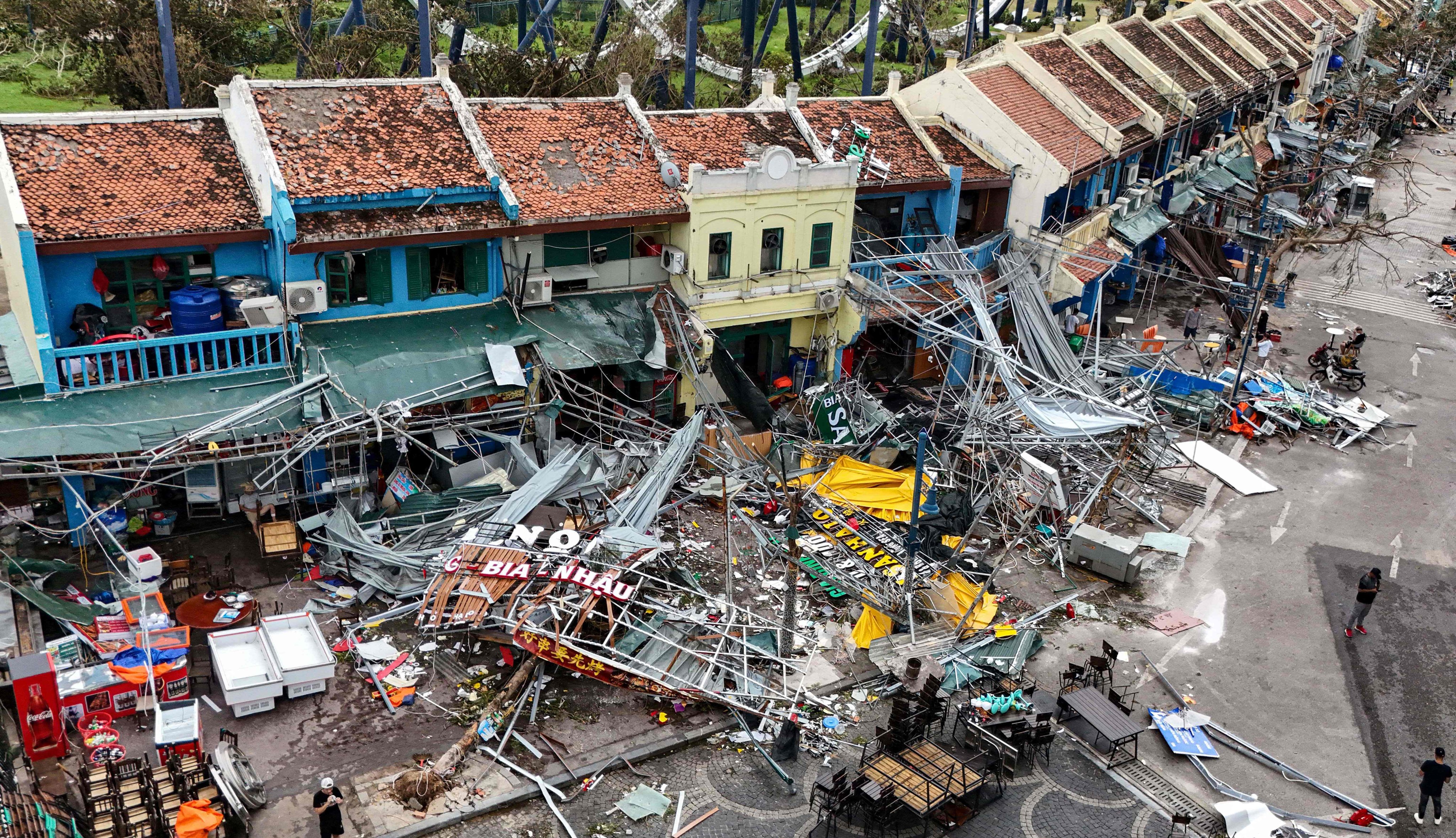 Damaged buildings and debris on a street after Super Typhoon Yagi hit Ha Long, in Vietnam’s Quang Ninh province, on September 8. Photo: AFP