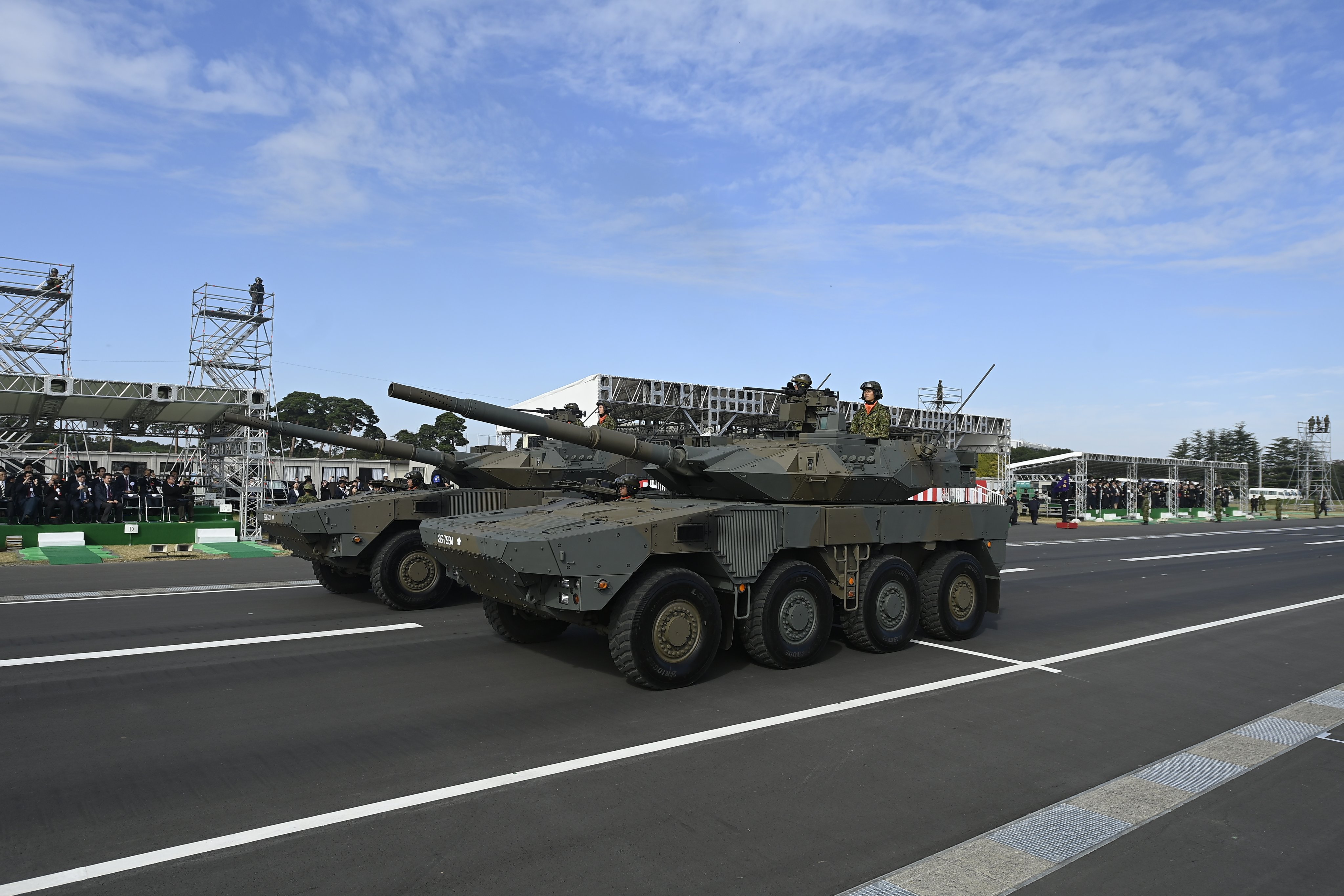 Armoured vehicles of Japan’s military take part in a parade in Asaka, Saitama prefecture, on November 9. Photo: EPA-EFE