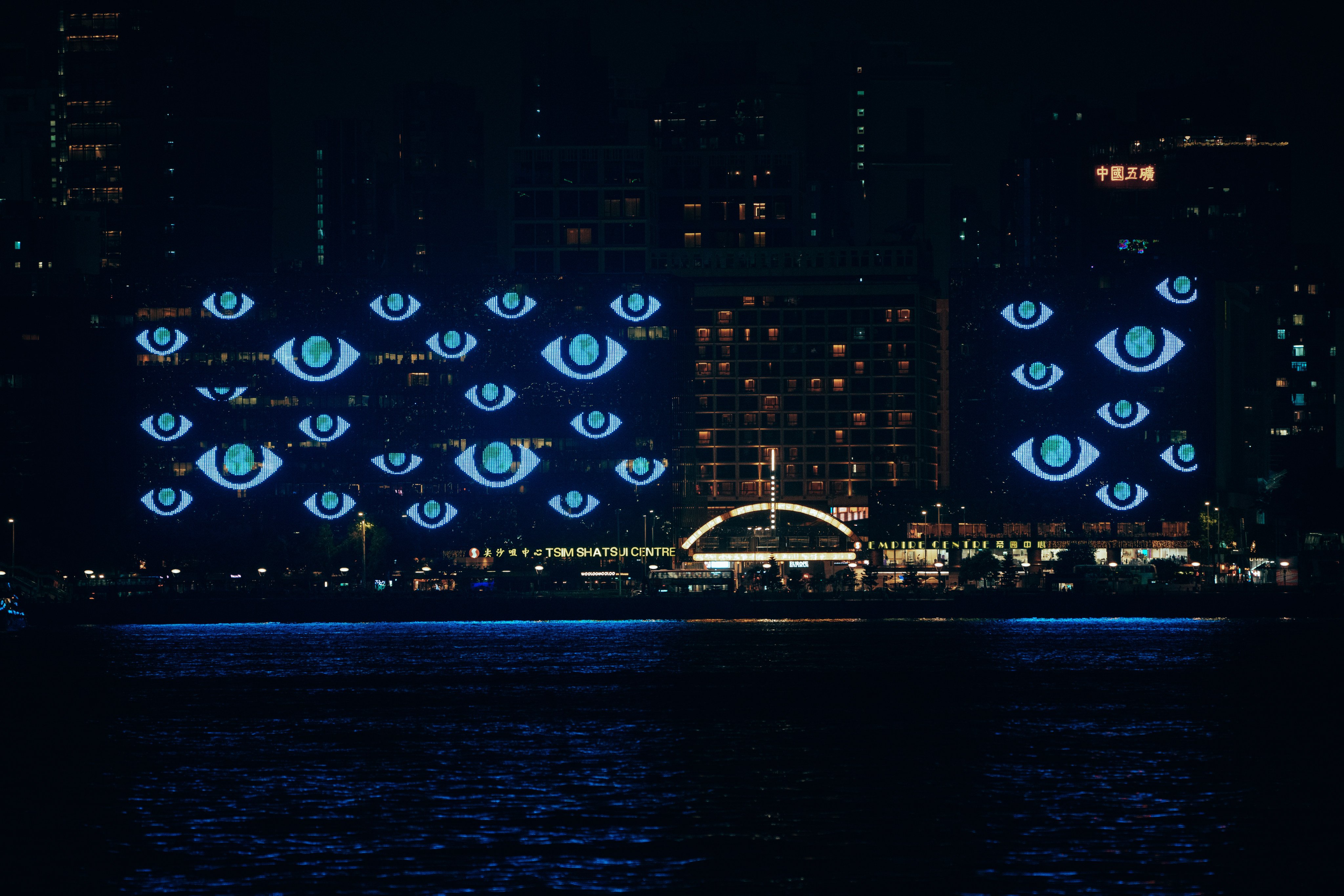 Facades on the Tsim Sha Tsui, Hong Kong waterfront illuminated with animations by motion graphics designer Kook Ewo and students from Gobelins School in Paris . Photo: courtesy of Kook Ewo