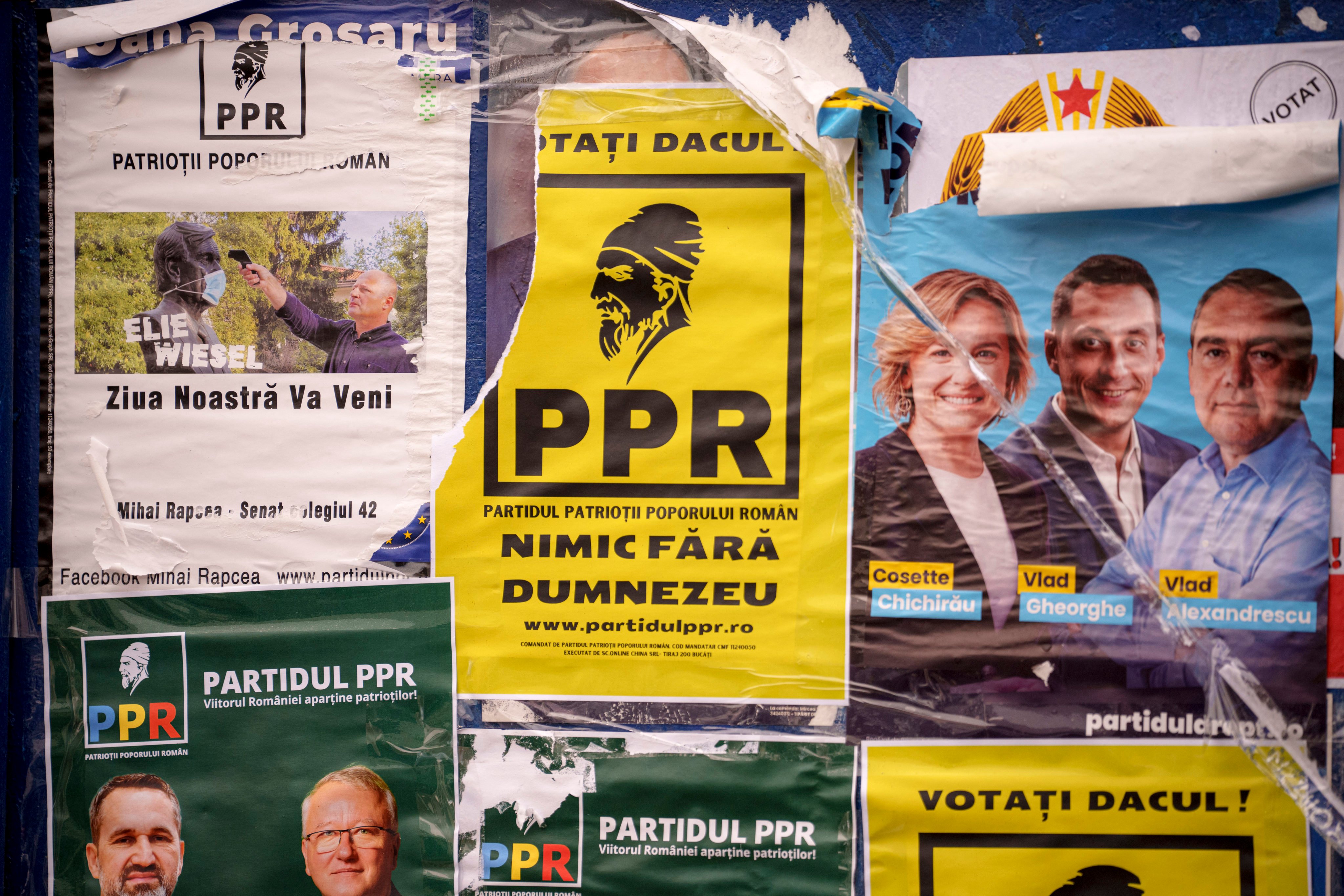 Posters ahead of the country’s December 1 parliamentary elections. Photo: AP