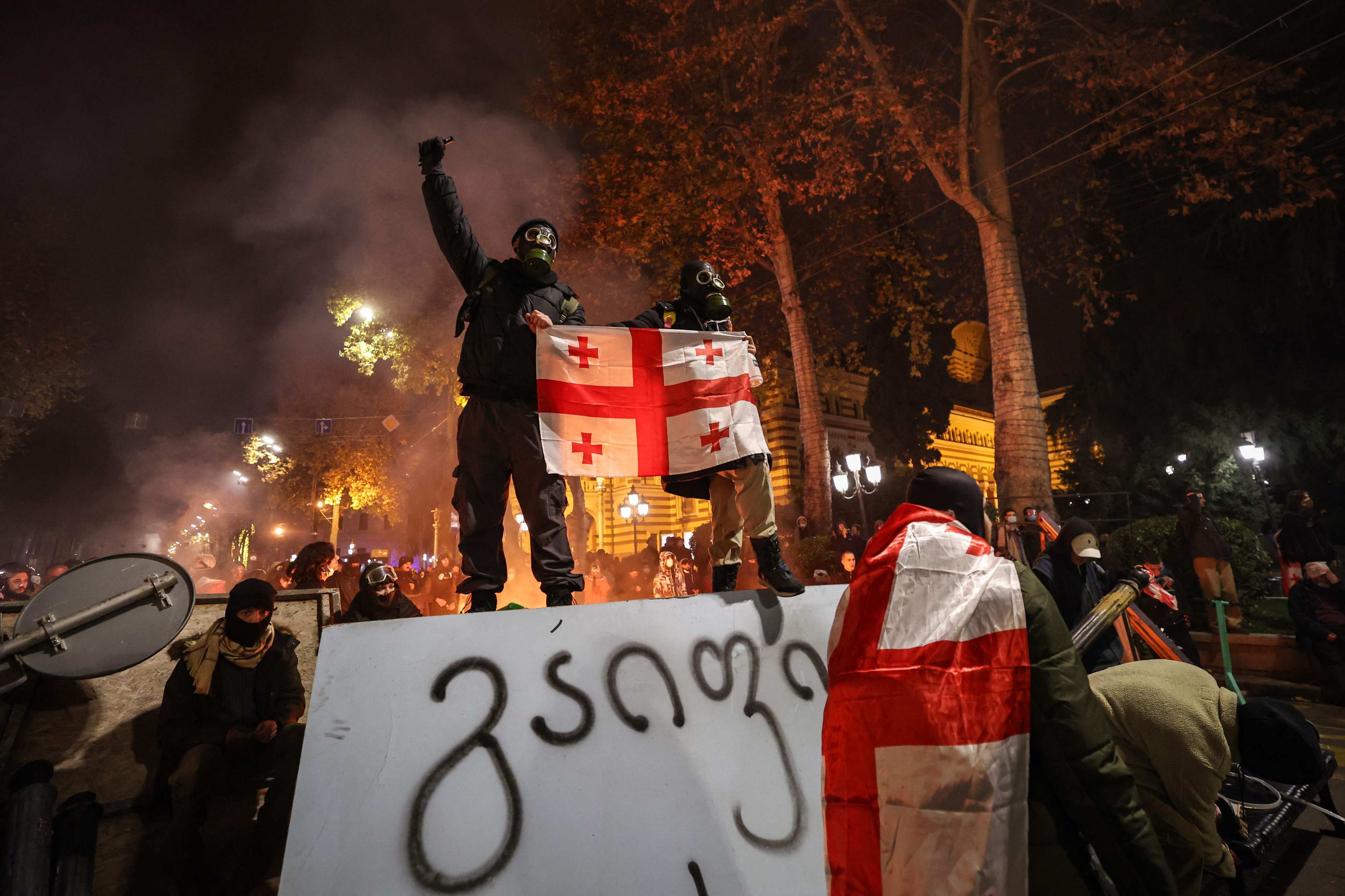 Protesters clash with police during a demonstration against the government’s decision to delay European Union membership talks amid a post-election crisis, outside the Georgia Parliament in Tbilisi. Photo: AFP