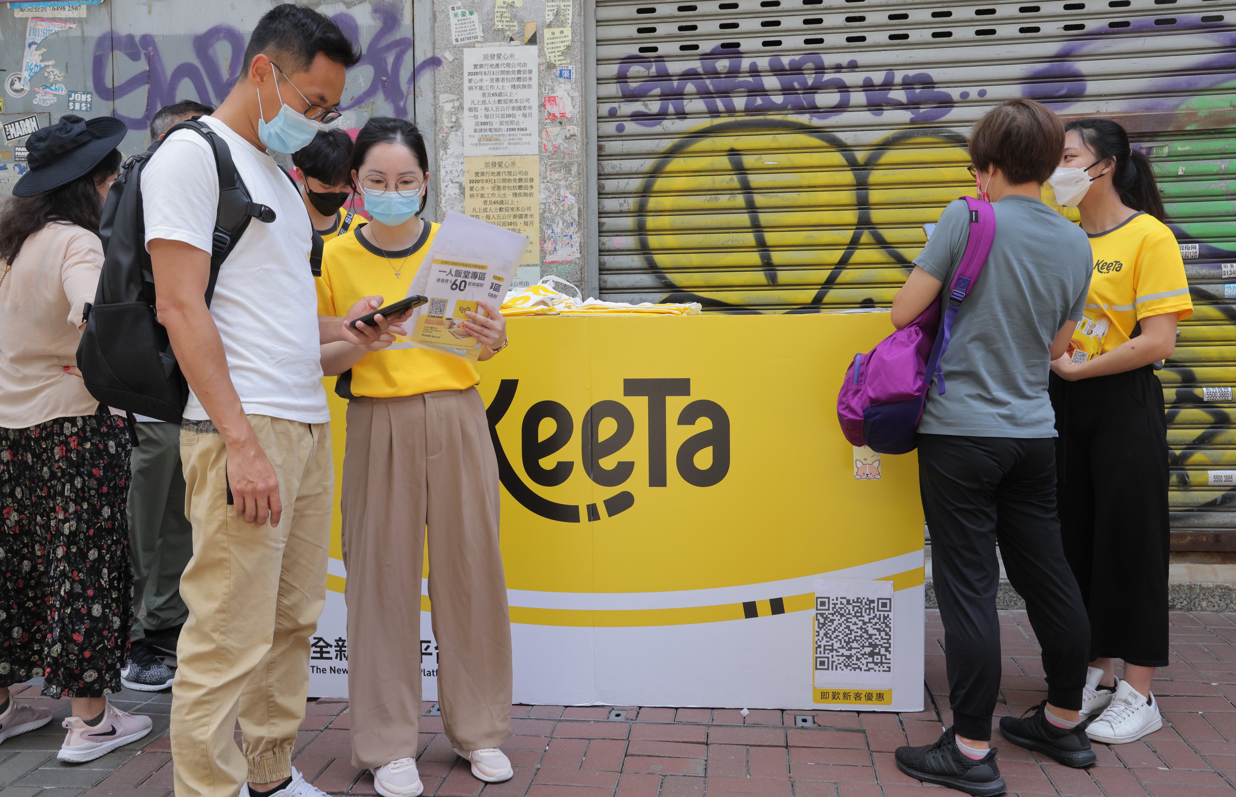 Keeta employees promote the food delivery service to customers in Hong Kong. Photo: Jelly Tse