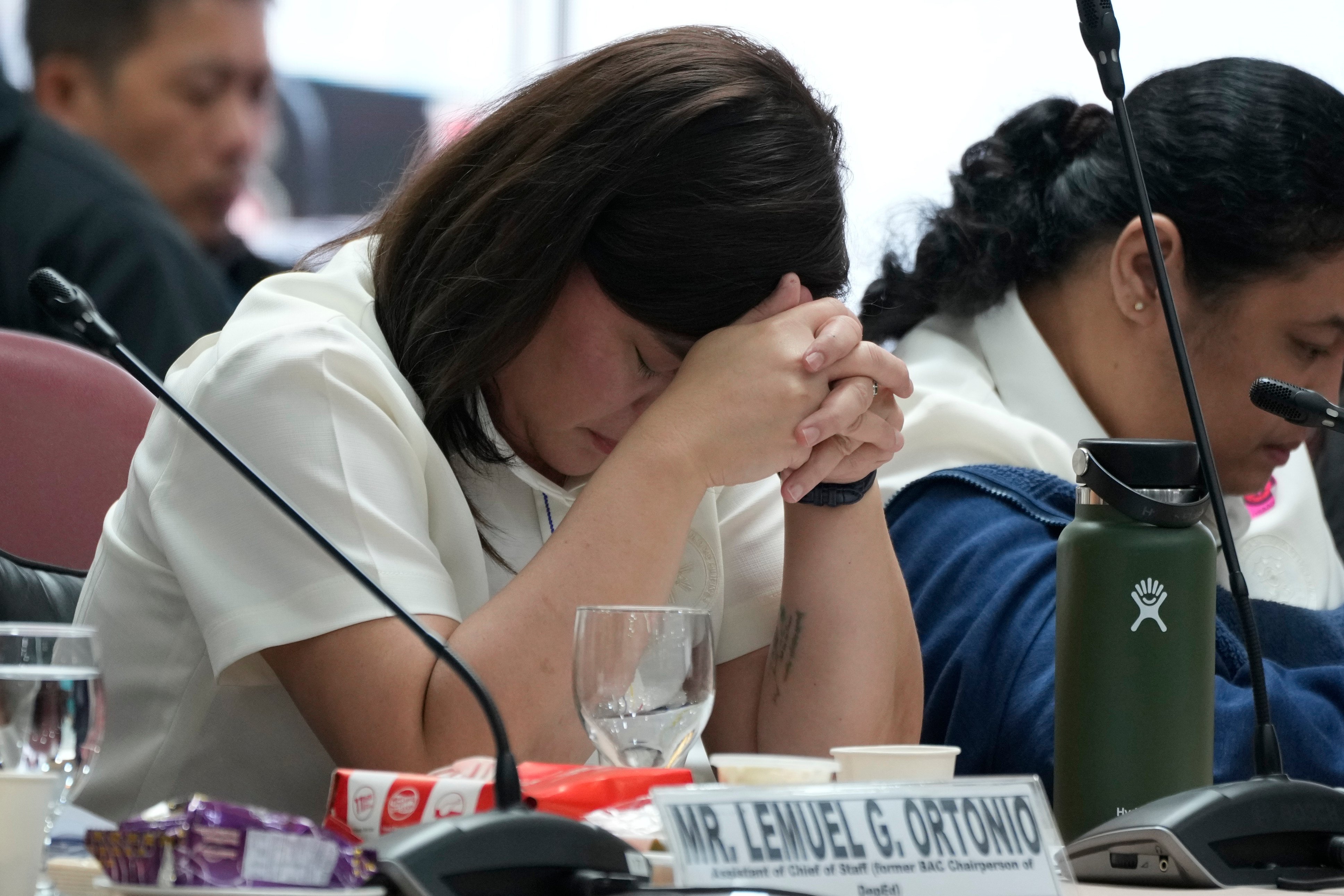 Philippine Vice-President Sara Duterte, left, listens as she attends a hearing at the House of Representatives in Quezon City, Philippines on November 25. Photo: AP