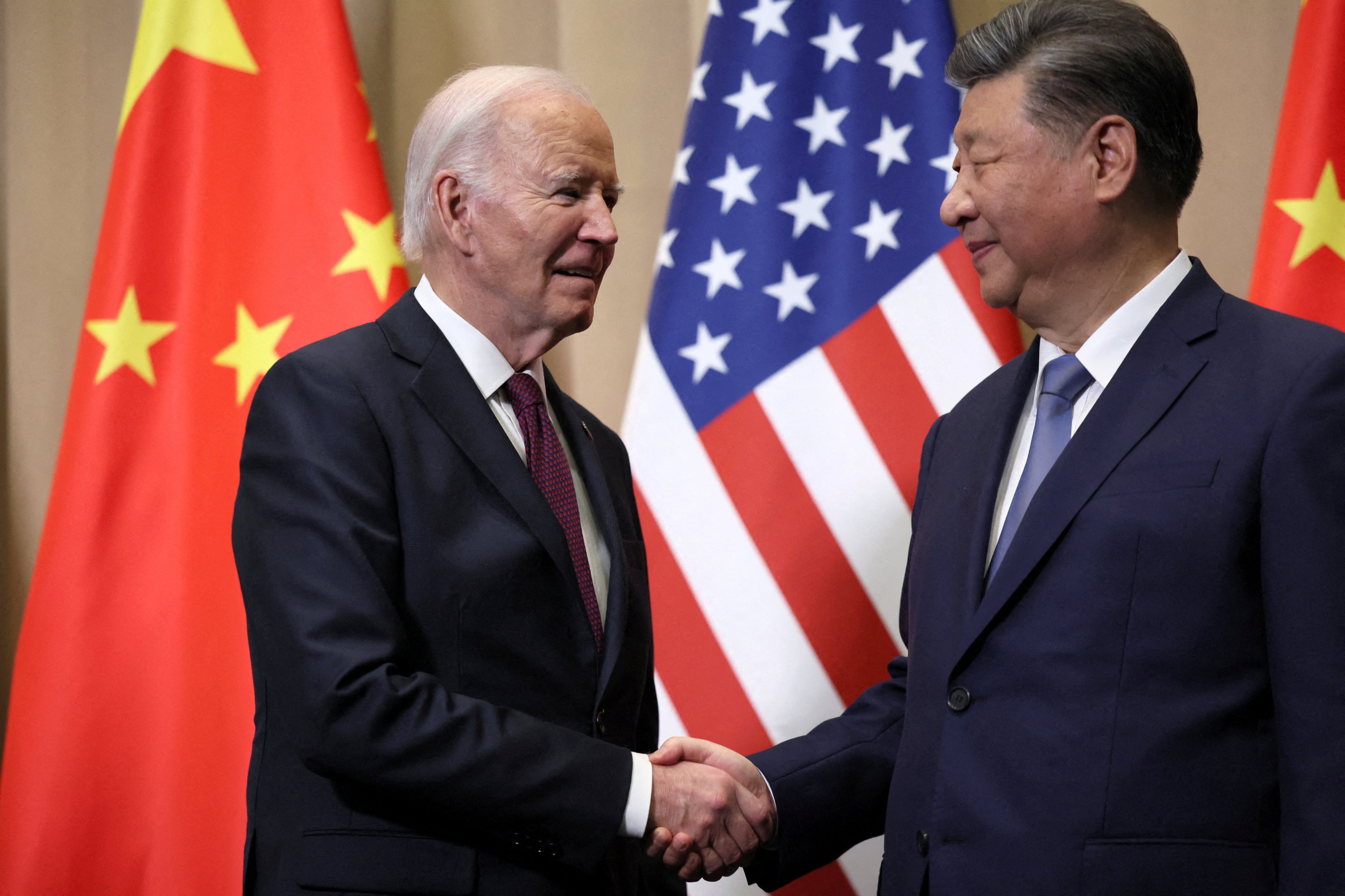 US President Joe Biden and Chinese President Xi Jinping shake hands at the Apec Summit in Lima, Peru. Photo: Reuters