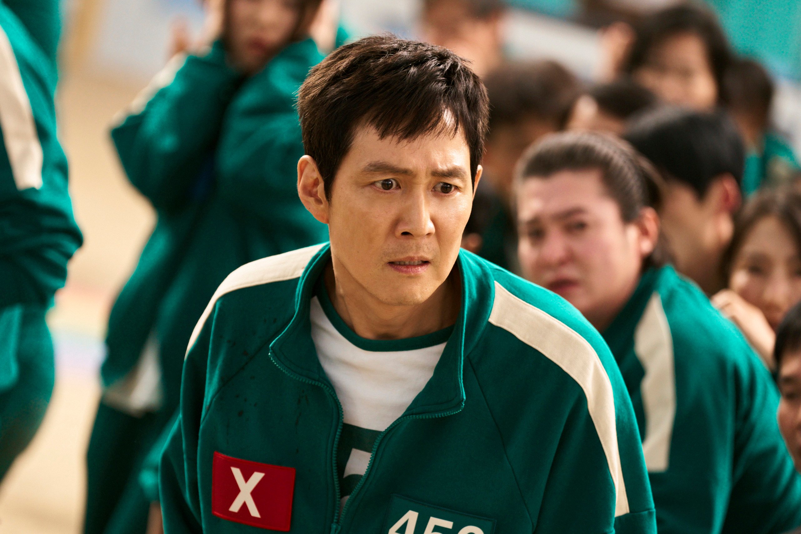 Lee Jung-jae as Seong Gi-hun in a still from Squid Game. Get ready for 12 new characters, twice as many killer robots, the return of certain faces and more in season two. Photo: Netflix