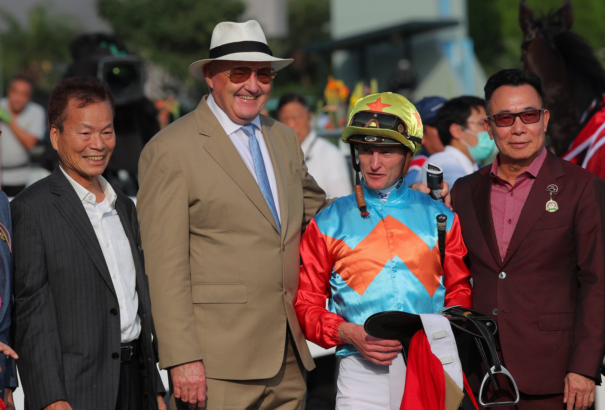 Trainer David Hayes (second from left), jockey Zac Purton and connections of Ka Ying Rising. Photo: Kenneth Chan