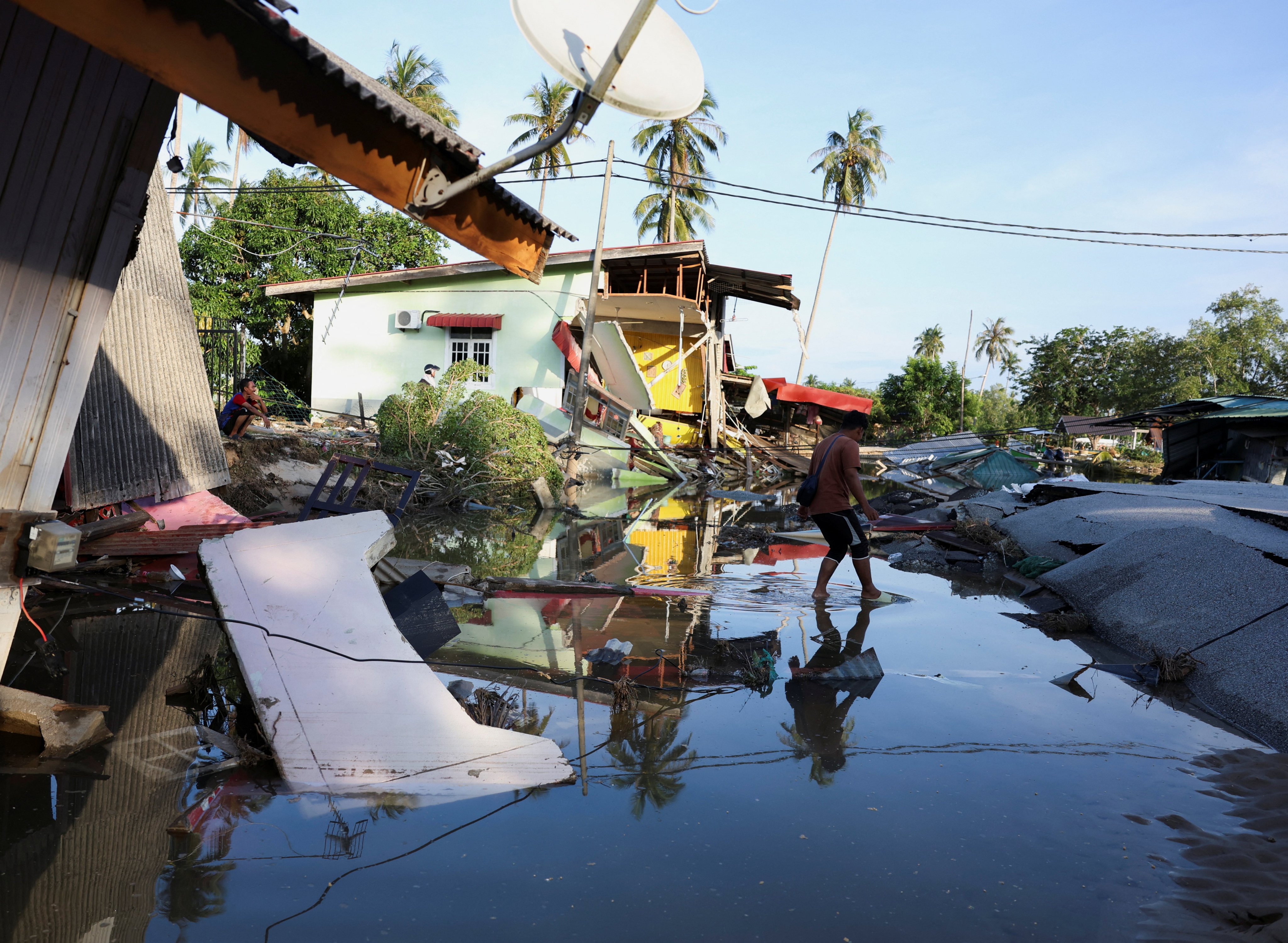 Houses destroyed by floodwaters pictured in Tumpat, Malaysia, on Monday. Photo: Reuters