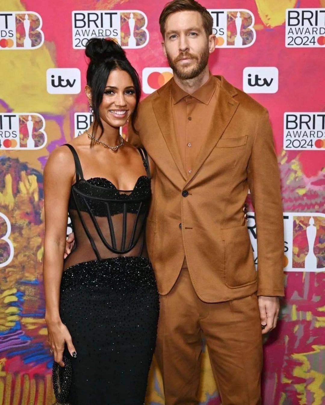 Vick Hope and Calvin Harris on the red carpet of the Brit Awards in March. Photo: @vicknhope/Instagram