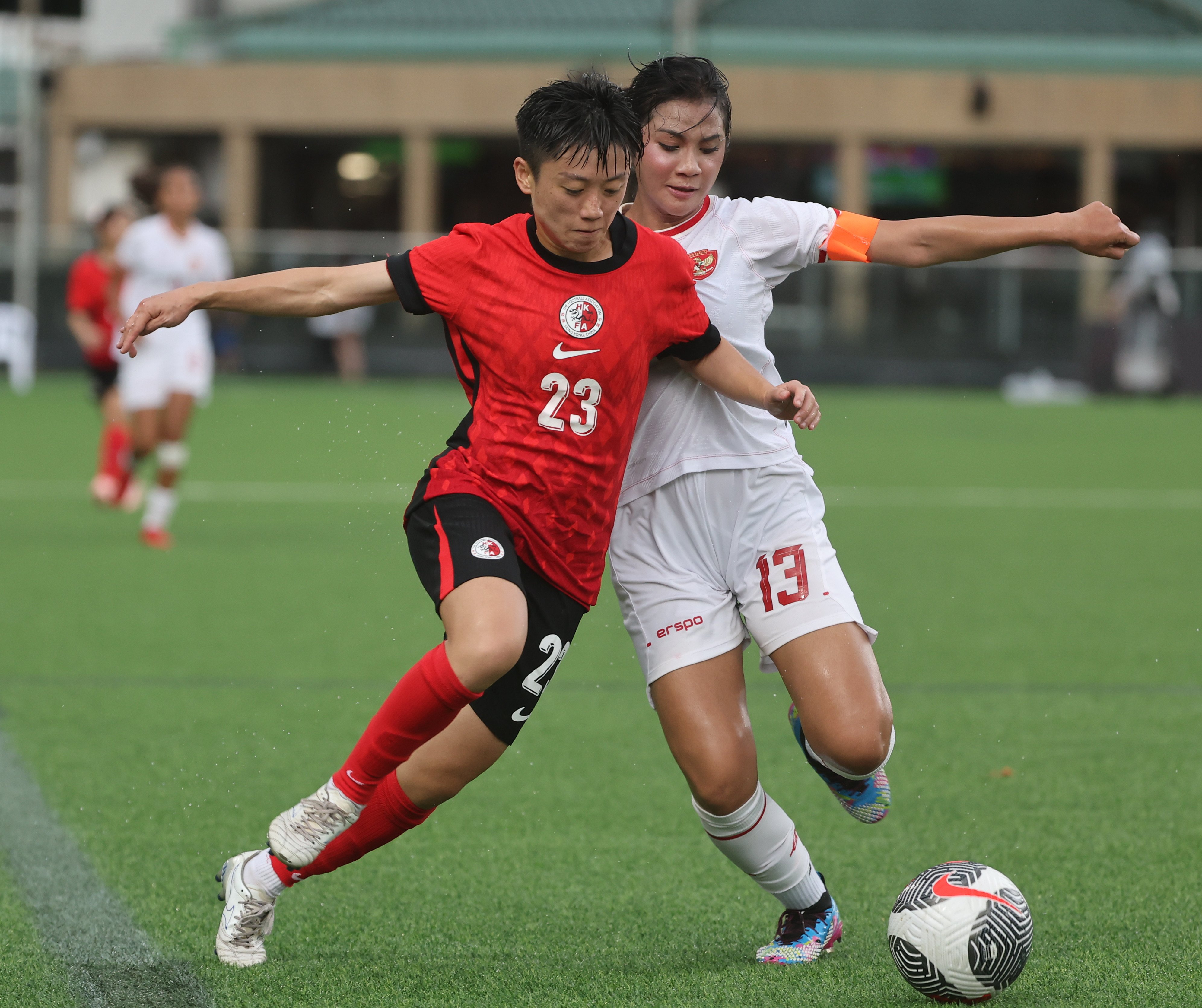 Citizen forward Ho Mui-mei battles for possession during Hong Kong’s victory over Indonesia in July. Photo: Edmond So