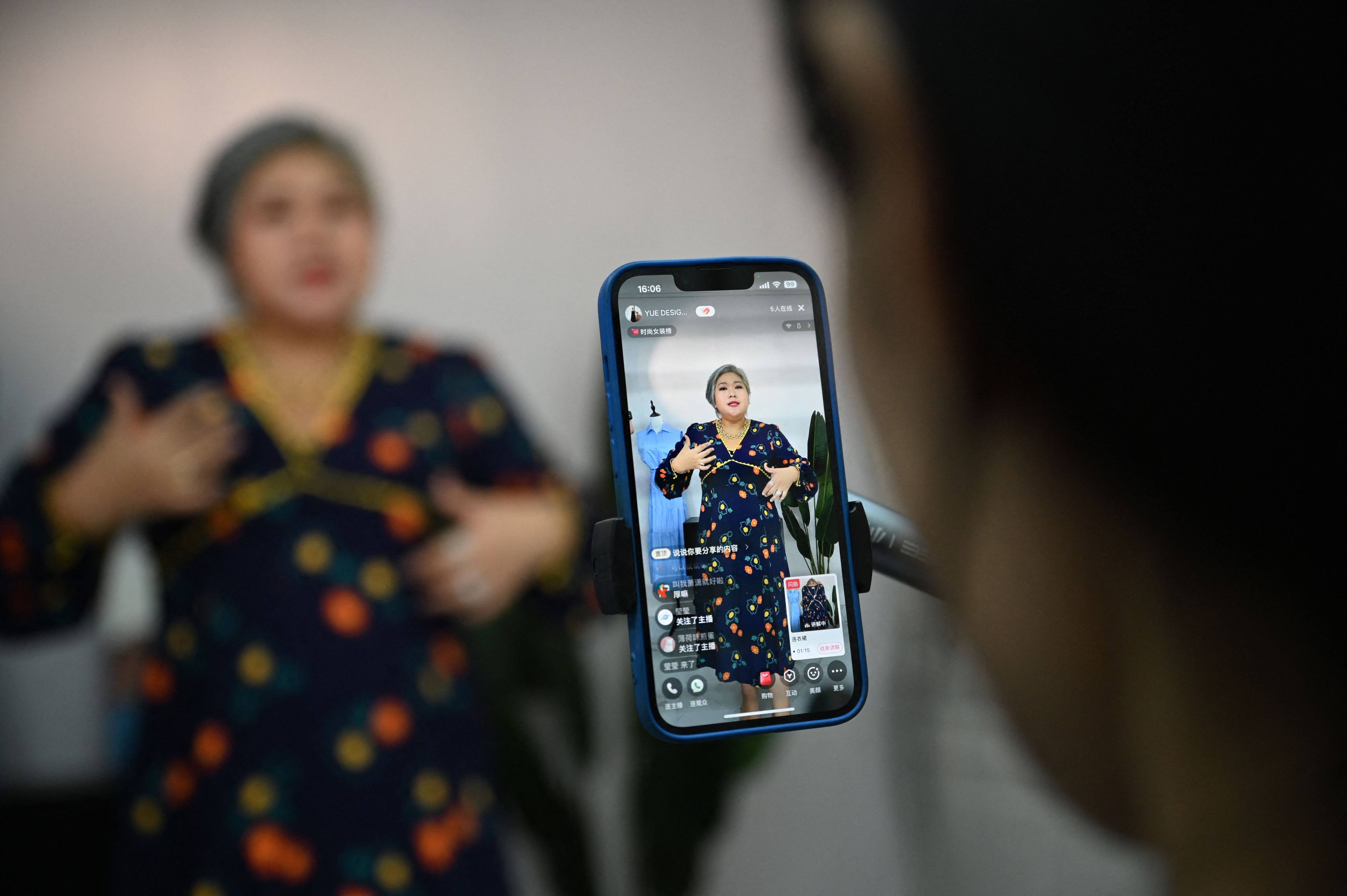 Amanda Yao live-streaming from her workshop. Photo: AFP