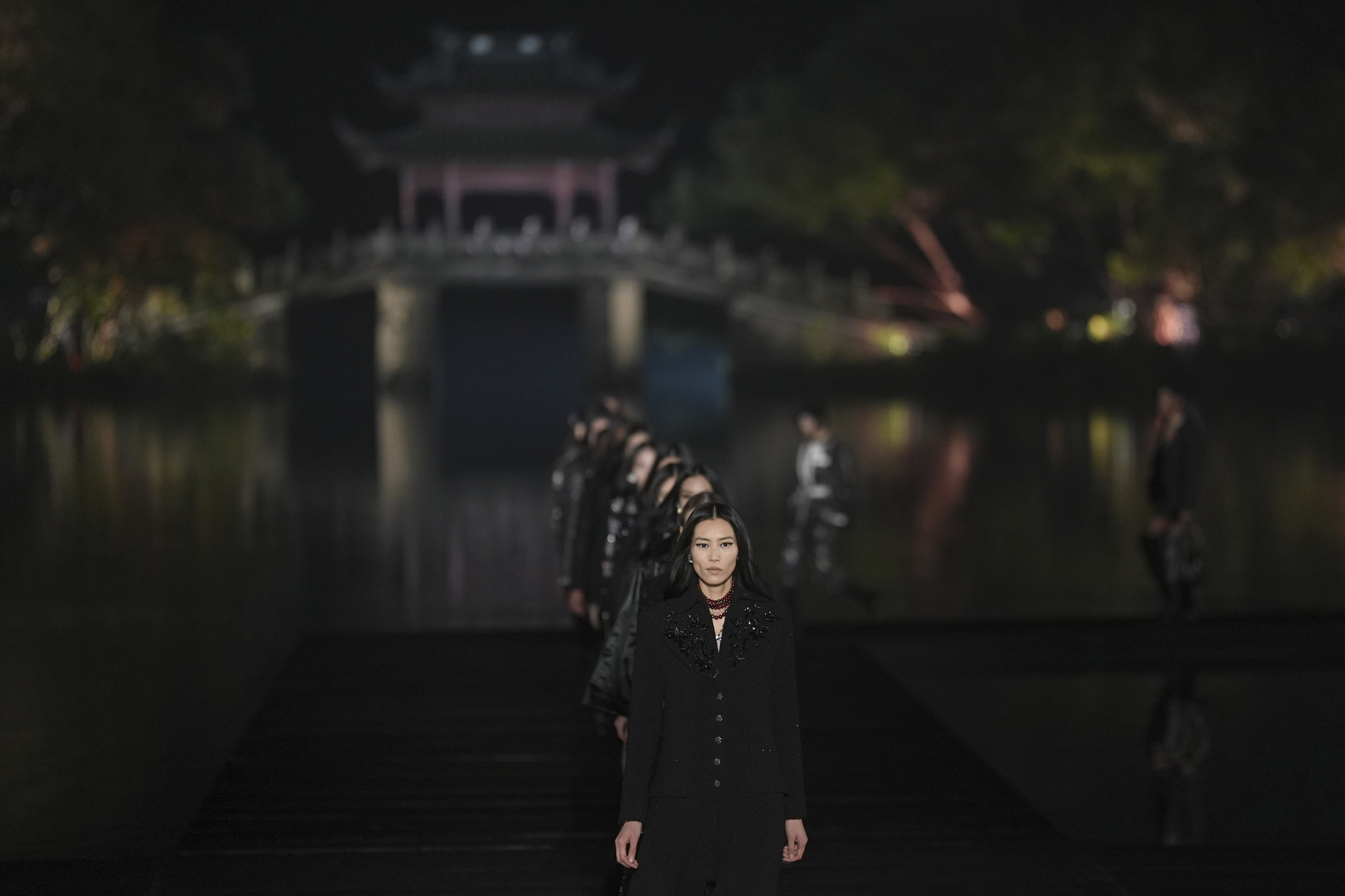 Liu Wen opened Chanel’s Métiers d’Art 2024-25 Hangzhou show – a celebration of Coco Chanel’s passion for Chinese culture, with a Wim Wenders video starring Tilda Swinton. Photo: AP