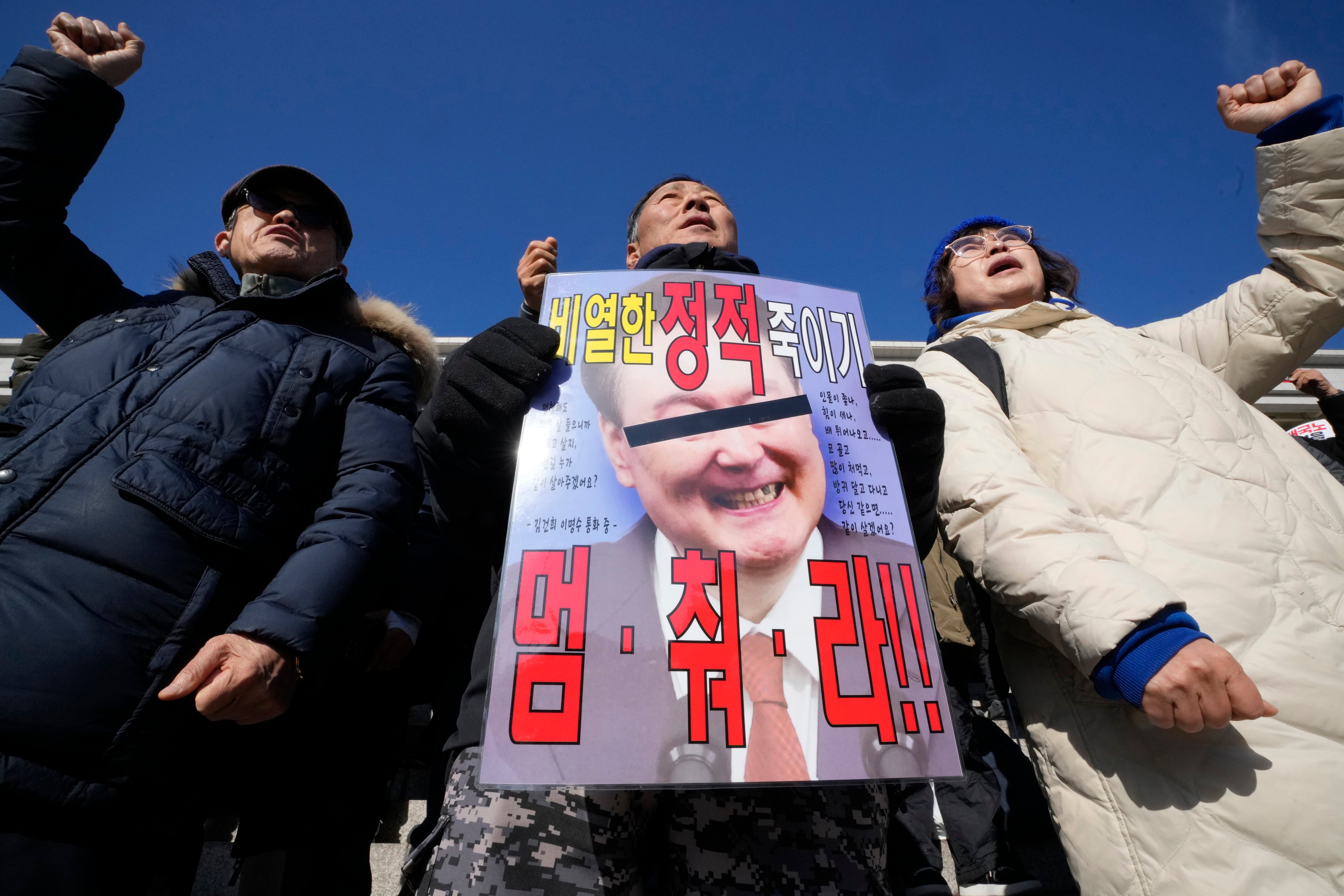 Members of main opposition Democratic Party attend a rally against South Korean President Yoon Suk-yeol at the National Assembly in Seoul on Wednesday. Photo: AP