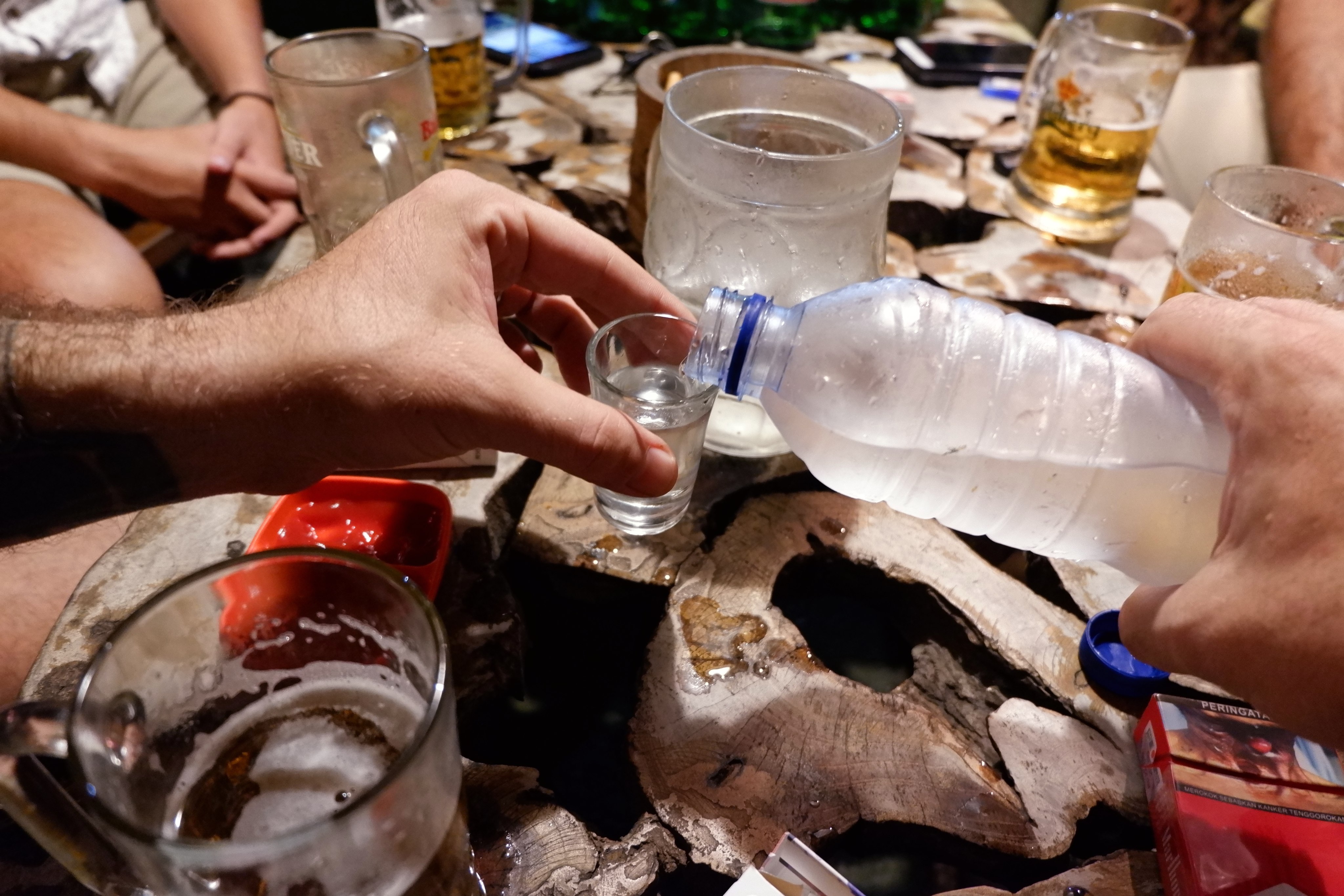 Traditional alcoholic drinks in Indonesia are typically made by fermenting rice, sugarcane, coconuts, or palm sugar. Photo: Handout/Risyiana Muthia