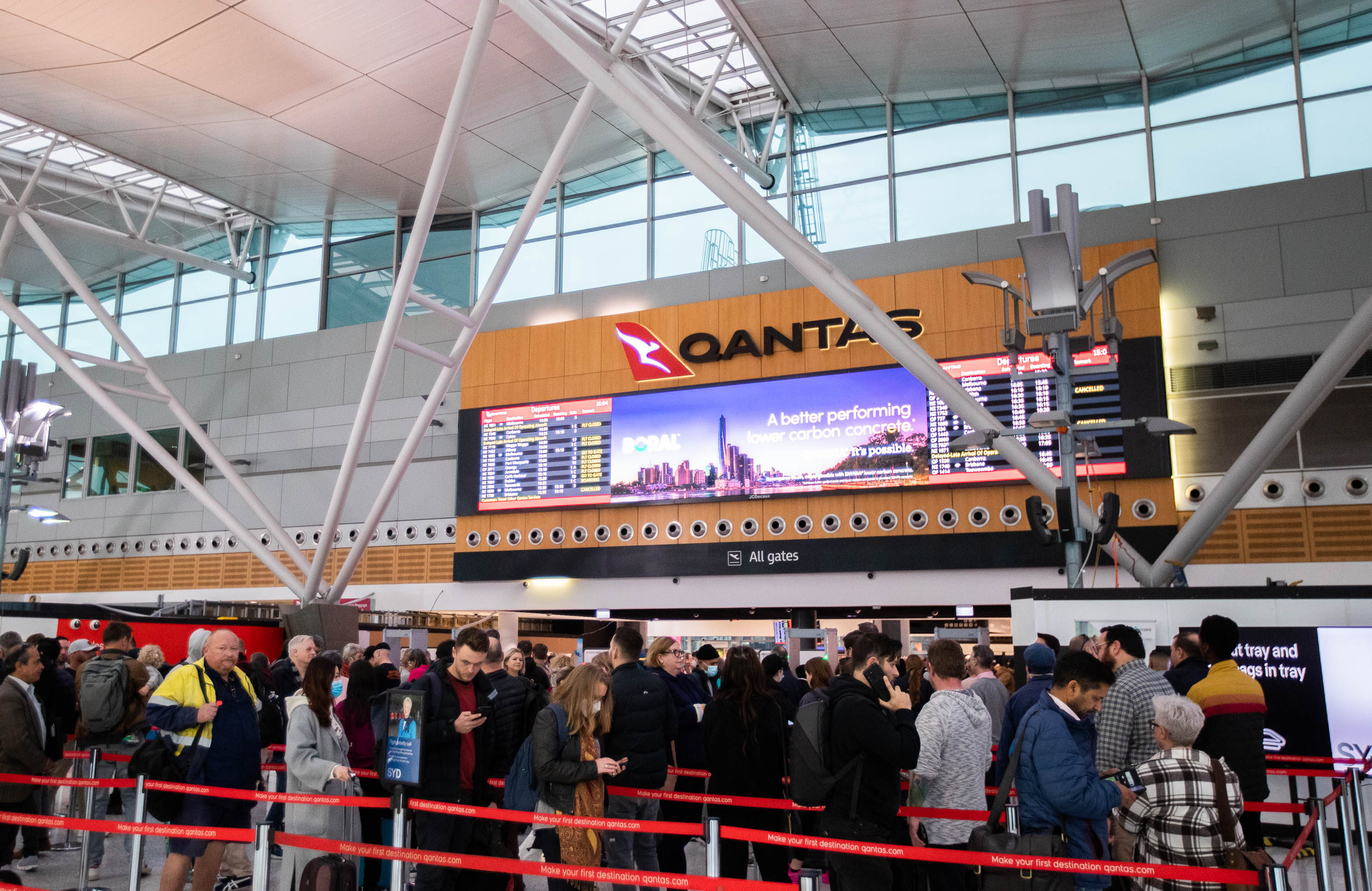 Passengers at Sydney airport. A man was charged over an incident in October involving alleged assault and illegal plane entry. Photo: Xinhua 