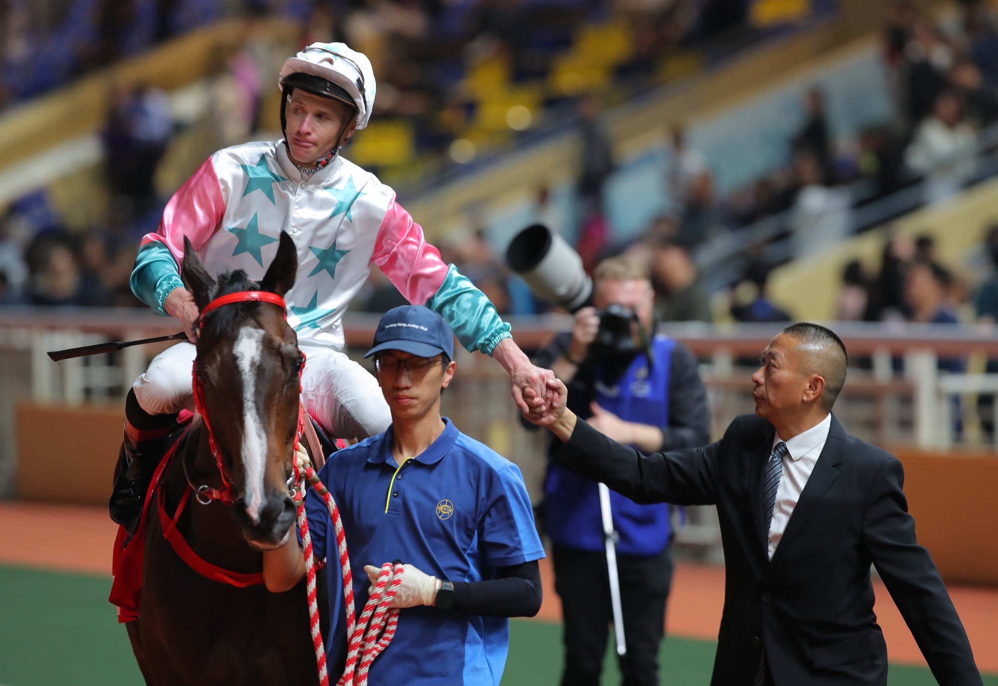 James McDonald greets Chill Chibi’s trainer Danny Shum after saluting at Happy Valley.