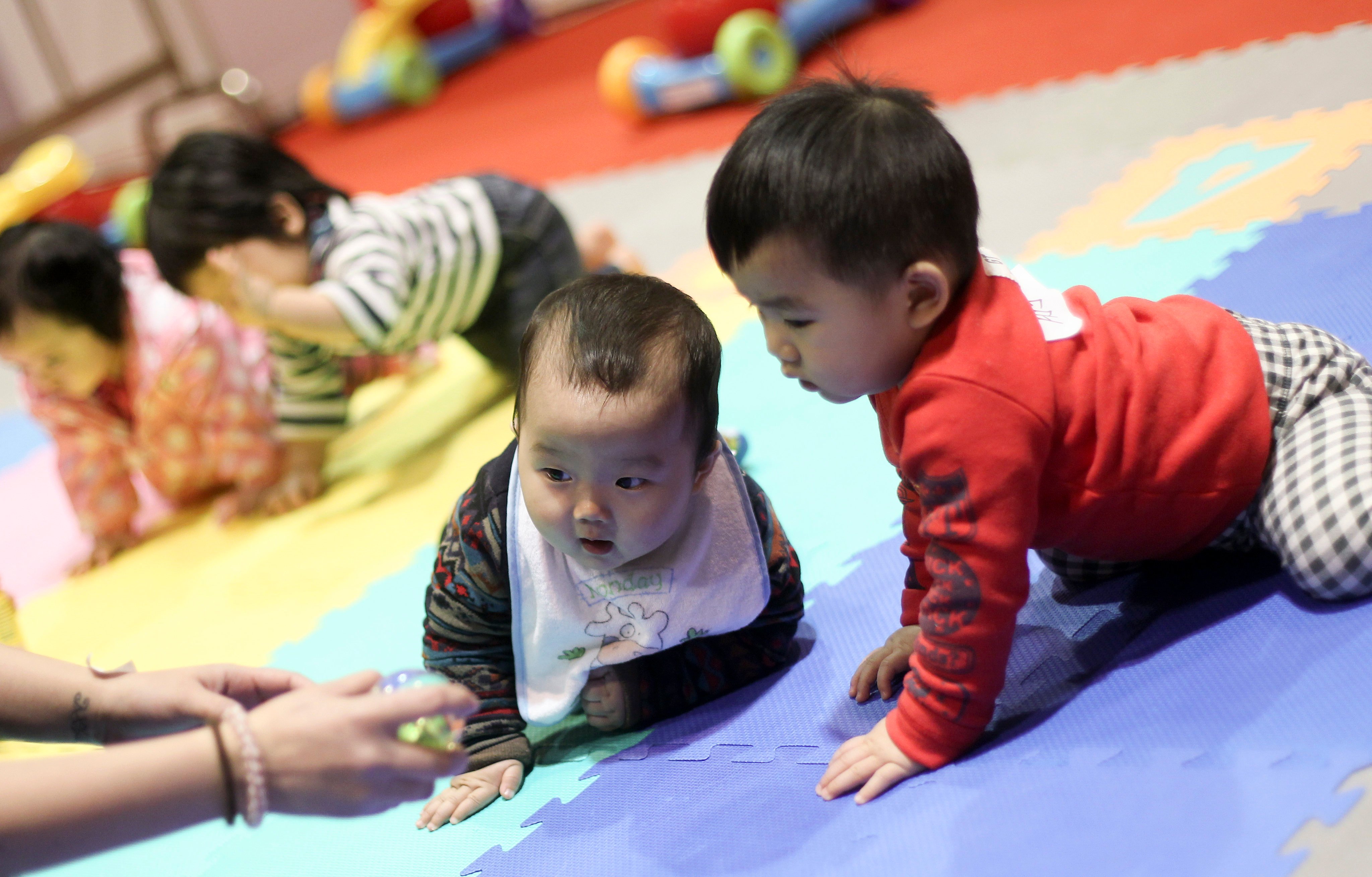 A Year of the Dragon baby boom in 2012 has boosted this year’s school intake. Photo: SCMP