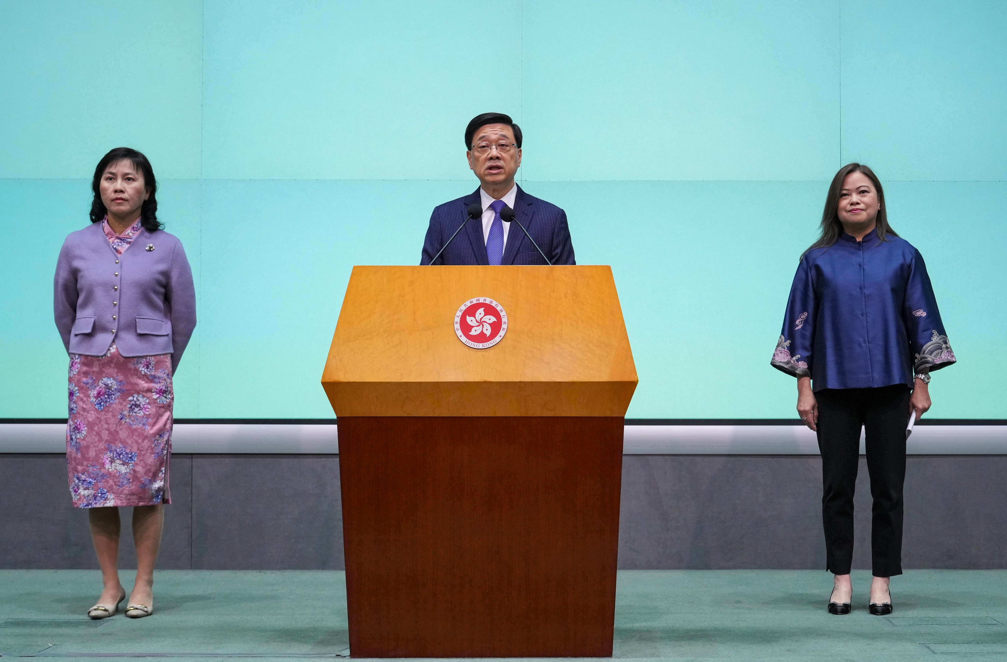 (From left) Mable Chan, Chief Executive John Lee and Rosanna Law. Photo: May Tse