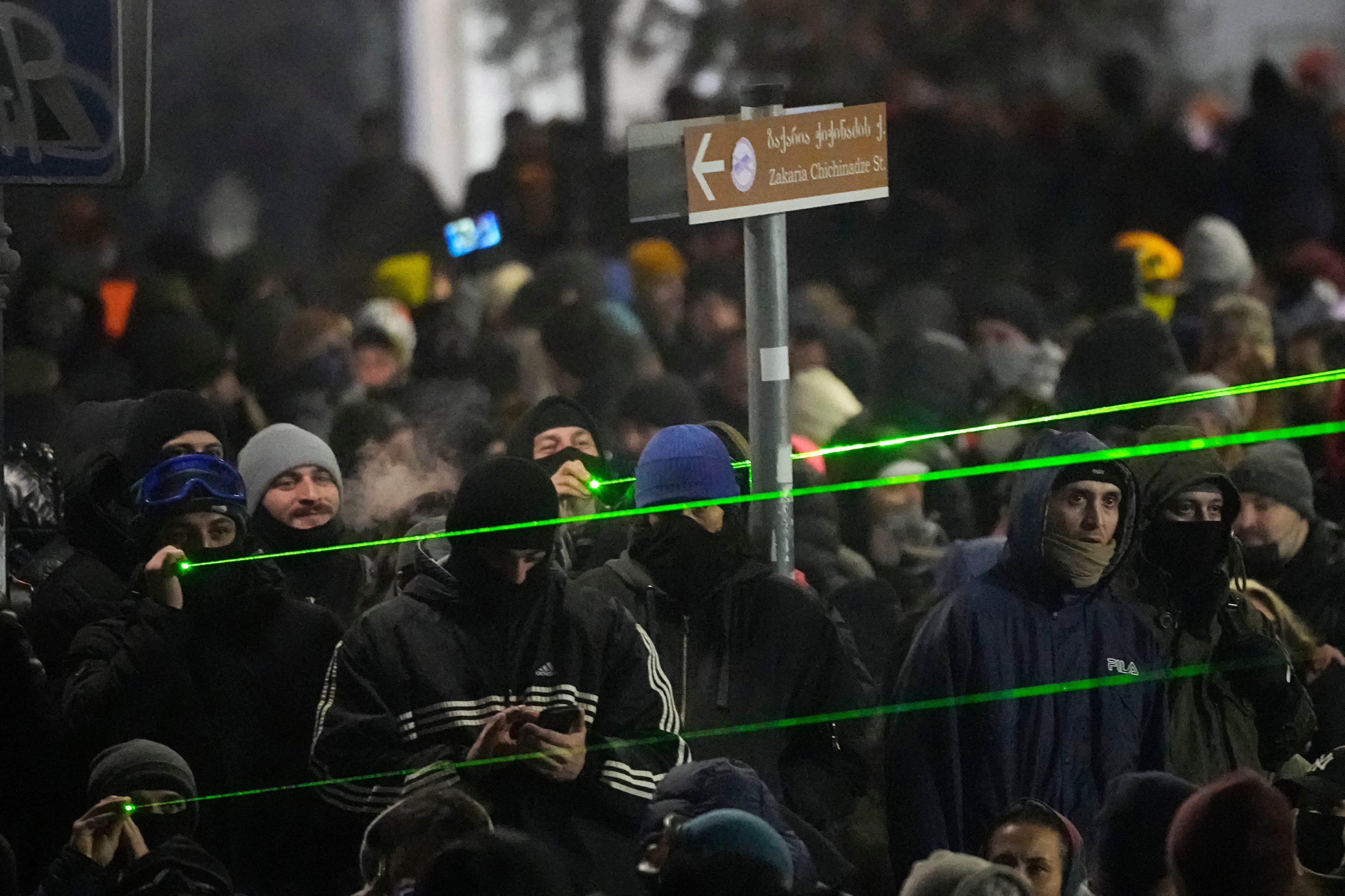 Demonstrators use lasers against the police in Tbilisi, Georgia. Photo: AP