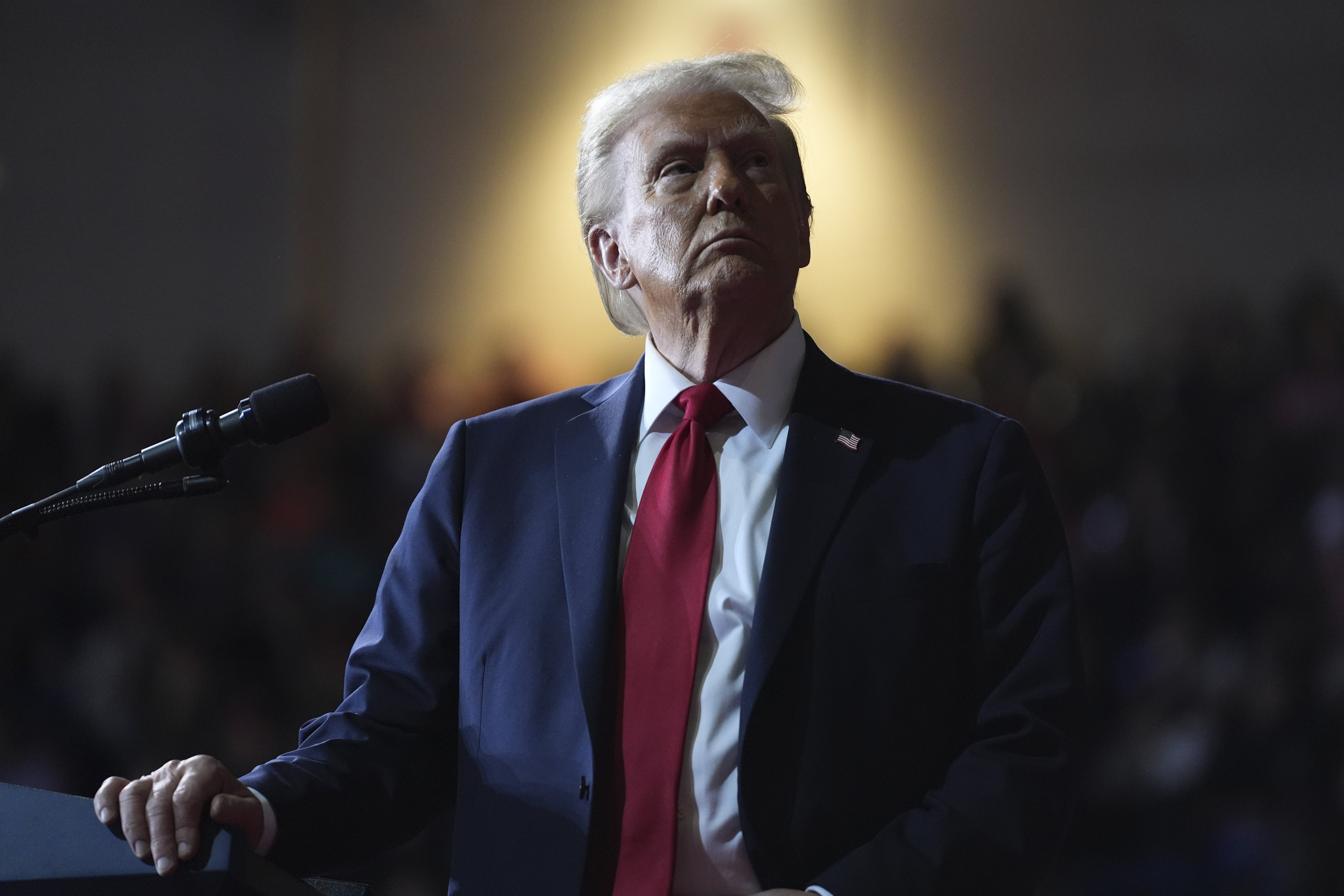 US president-elect Donald Trump watches a video screen during his election campaign at a rally in Salem, November 2, 2024. Photo: AP