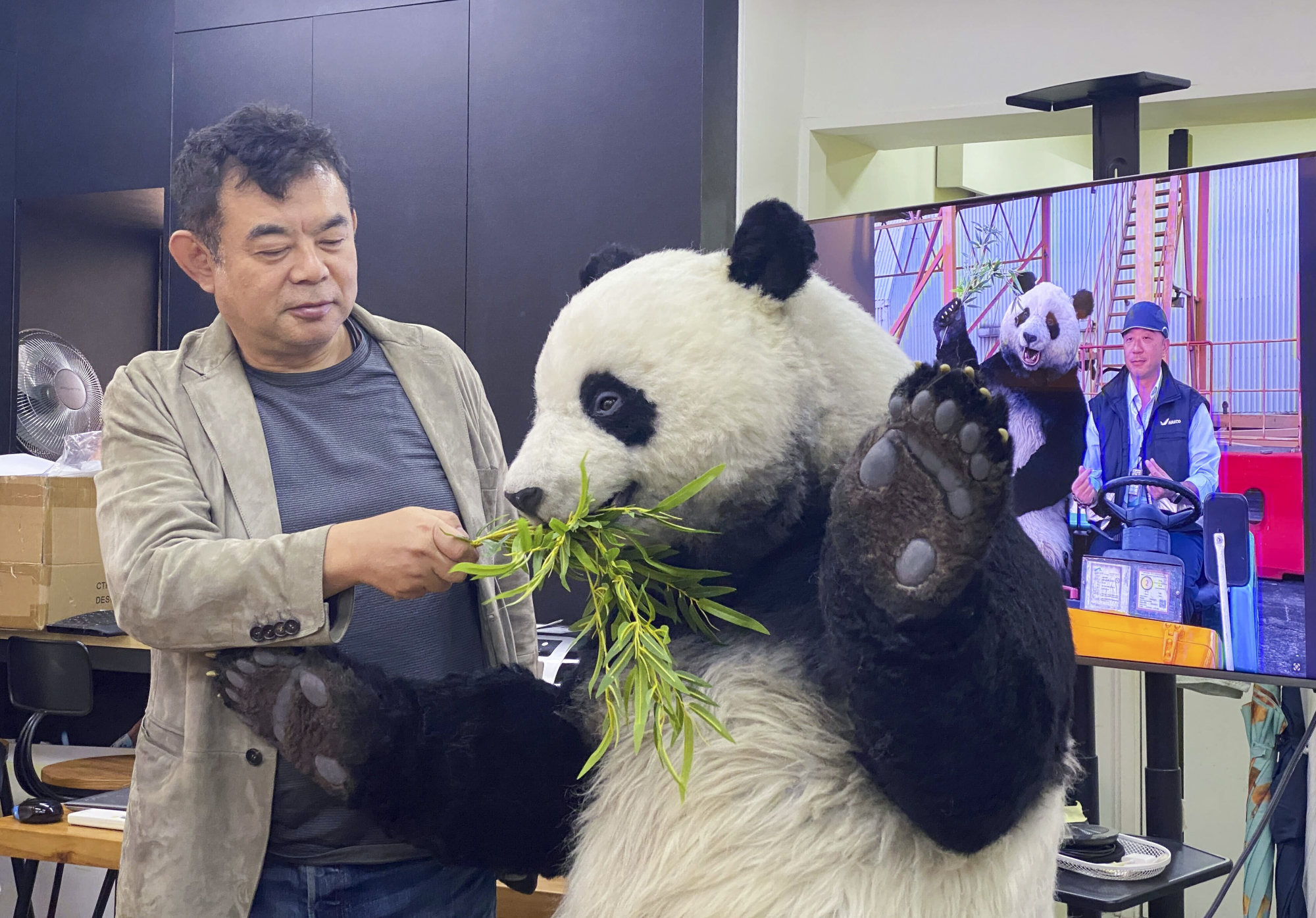 Zeppet founder Junya Okabe showcases the panda costume. Photo: Fan Chen