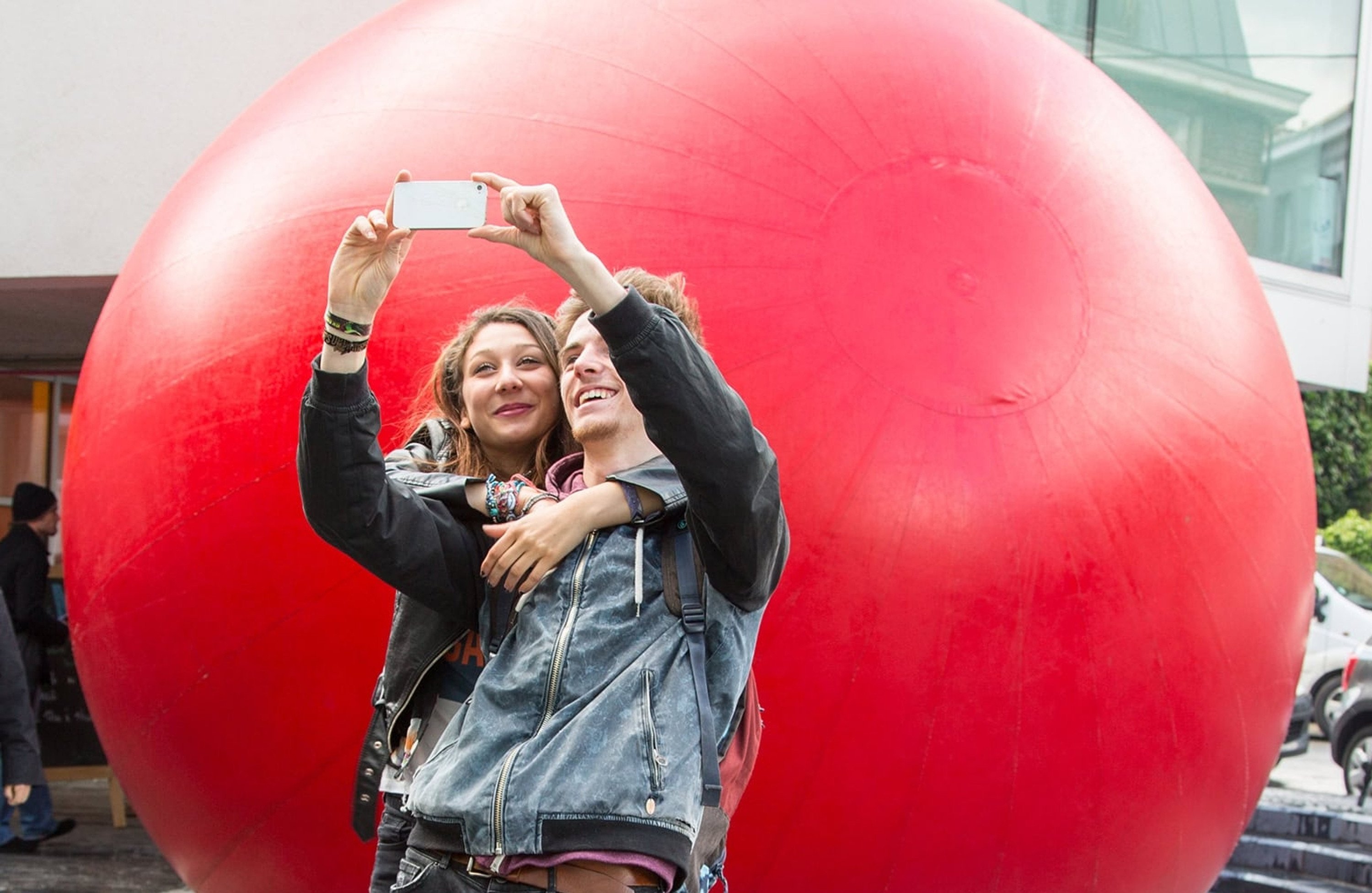 The RedBall public art installation by American artist Kurt Perschke is in Hong Kong. Photo: Brit Morgan