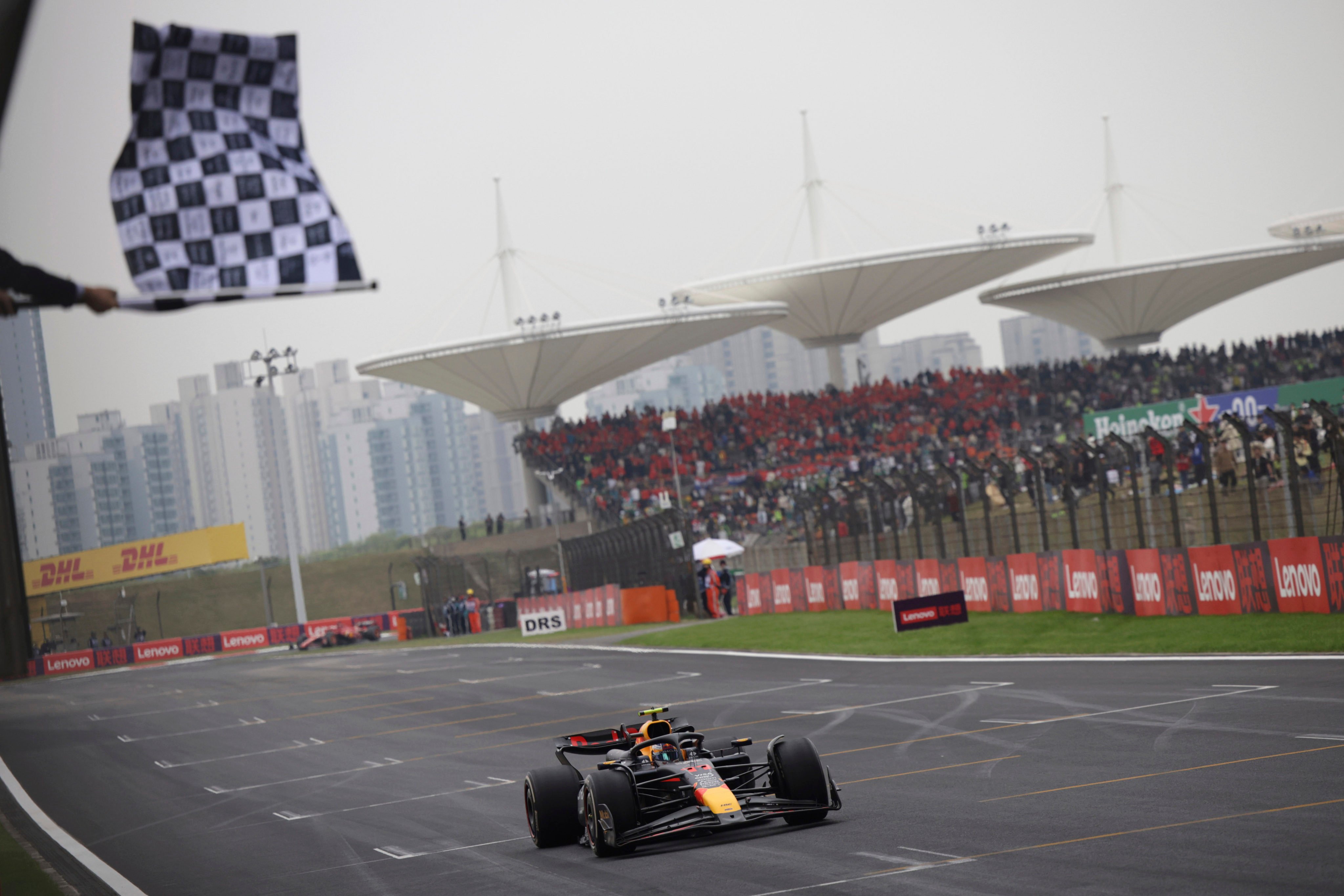 Red Bull driver Sergio Perez of Mexico crosses the finish line to place third at April’s Chinese Grand Prix in Shanghai. Photo: AP