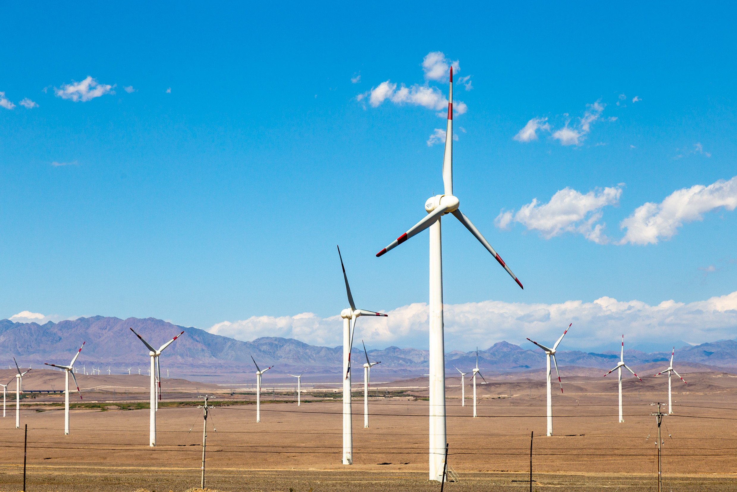 A wind farm along the highway from Turpan to Urumqi in Xinjiang, China. Photo: Shutterstock