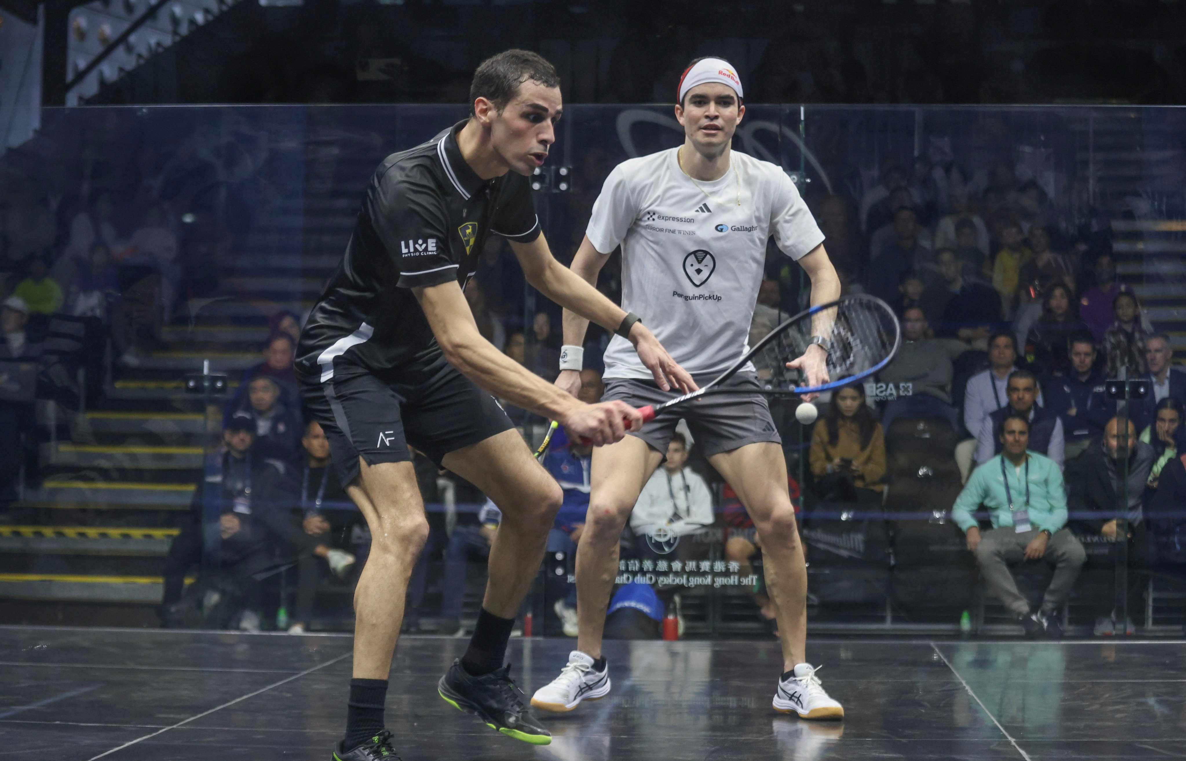 Ali Farag hits through a backhand during his semi-final victory over Diego Elias. Photo: Jonathan Wong