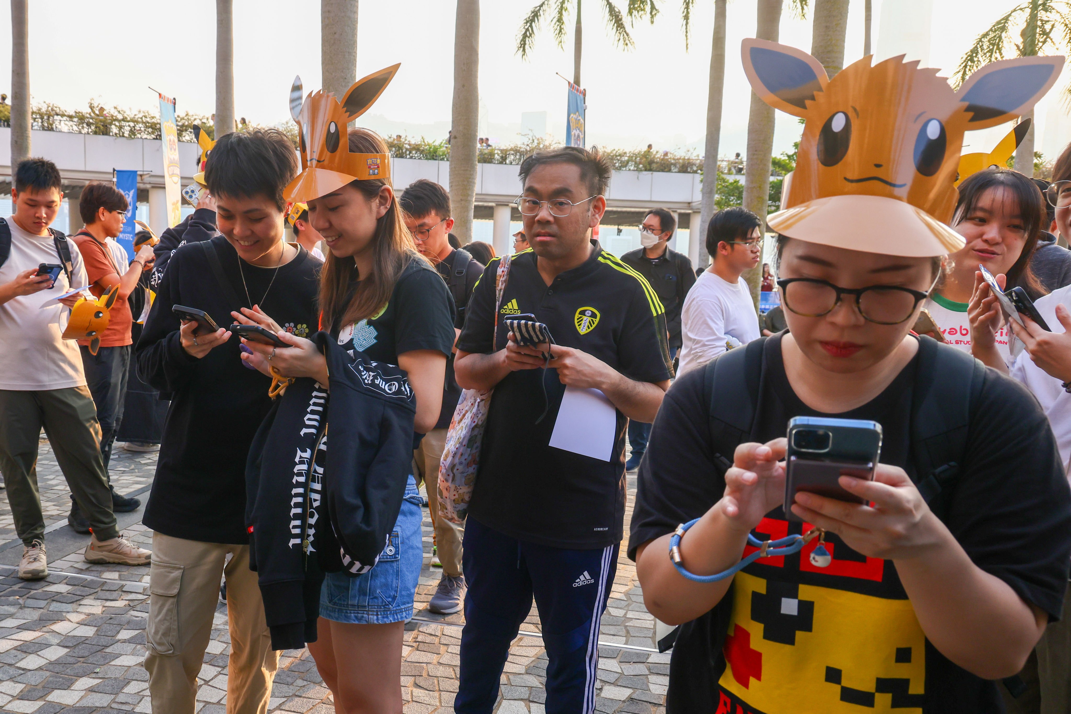 Pokemon Go players gather outside the Hong Kong Cultural Centre. Photo: Dickson Lee