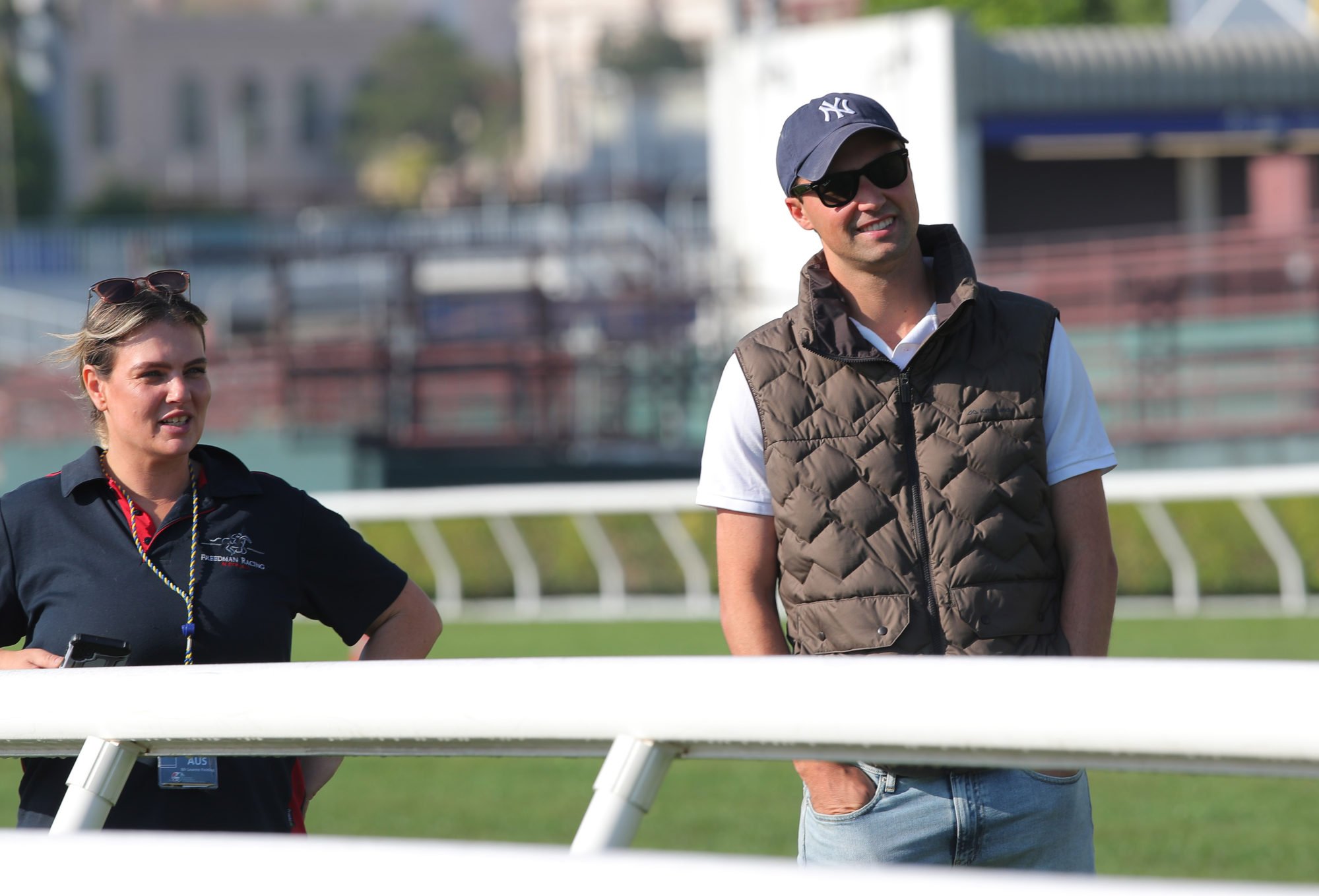 Trainer Sam Freedman (right) oversees Without A Fight’s track gallop at Sha Tin.