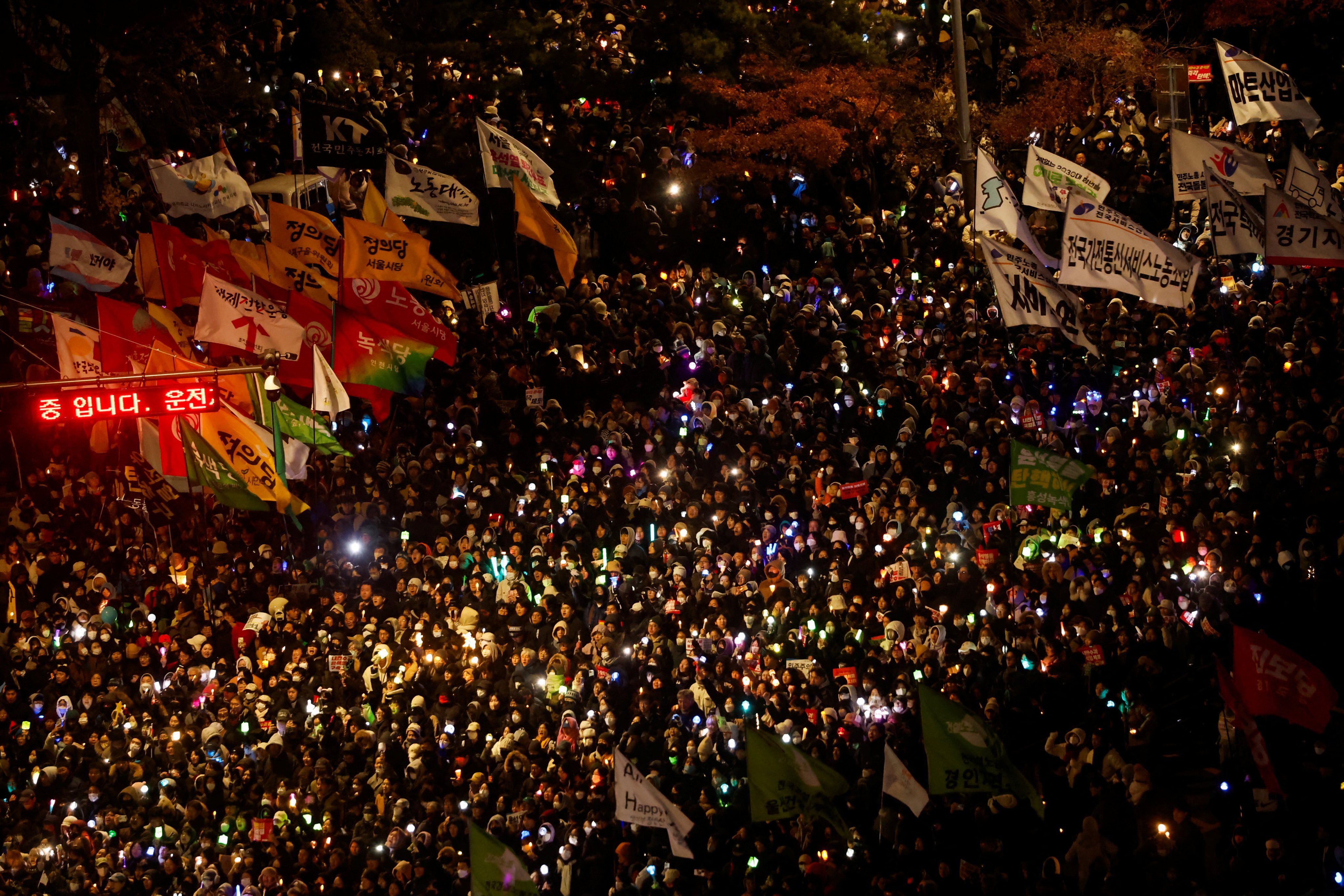 Protesters take part in a rally calling for the impeachment of South Korean President Yoon Suk-yeol in Seoul on Saturday. Photo: Reuters