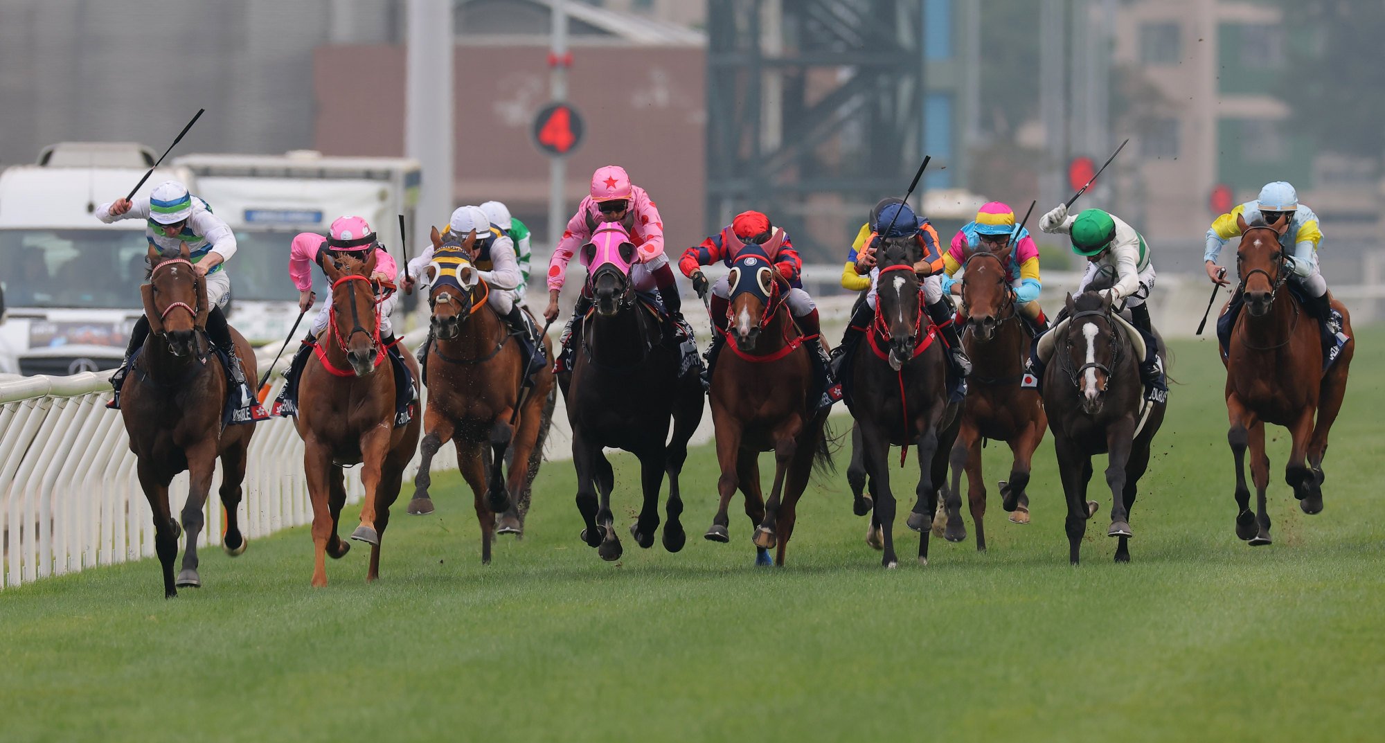 Voyage Bubble (left) leads the Group One Longines Hong Kong Mile.