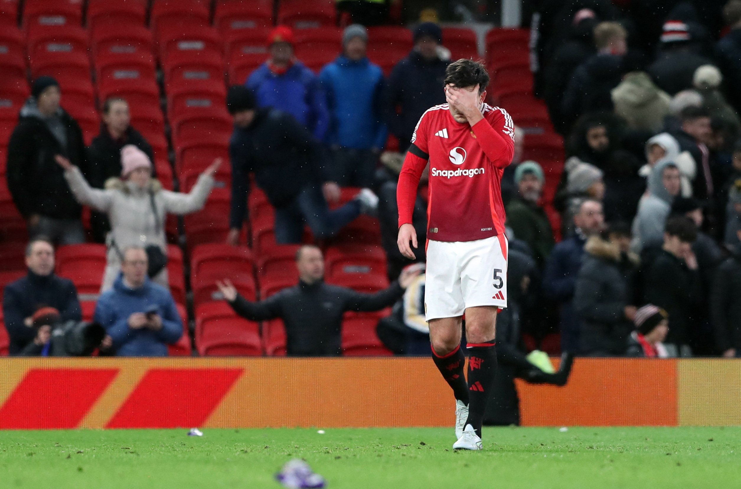 Manchester United’s Harry Maguire walks off after his side’s first defeat at home to Nottingham Forest in 30 years. Photo: Reuters