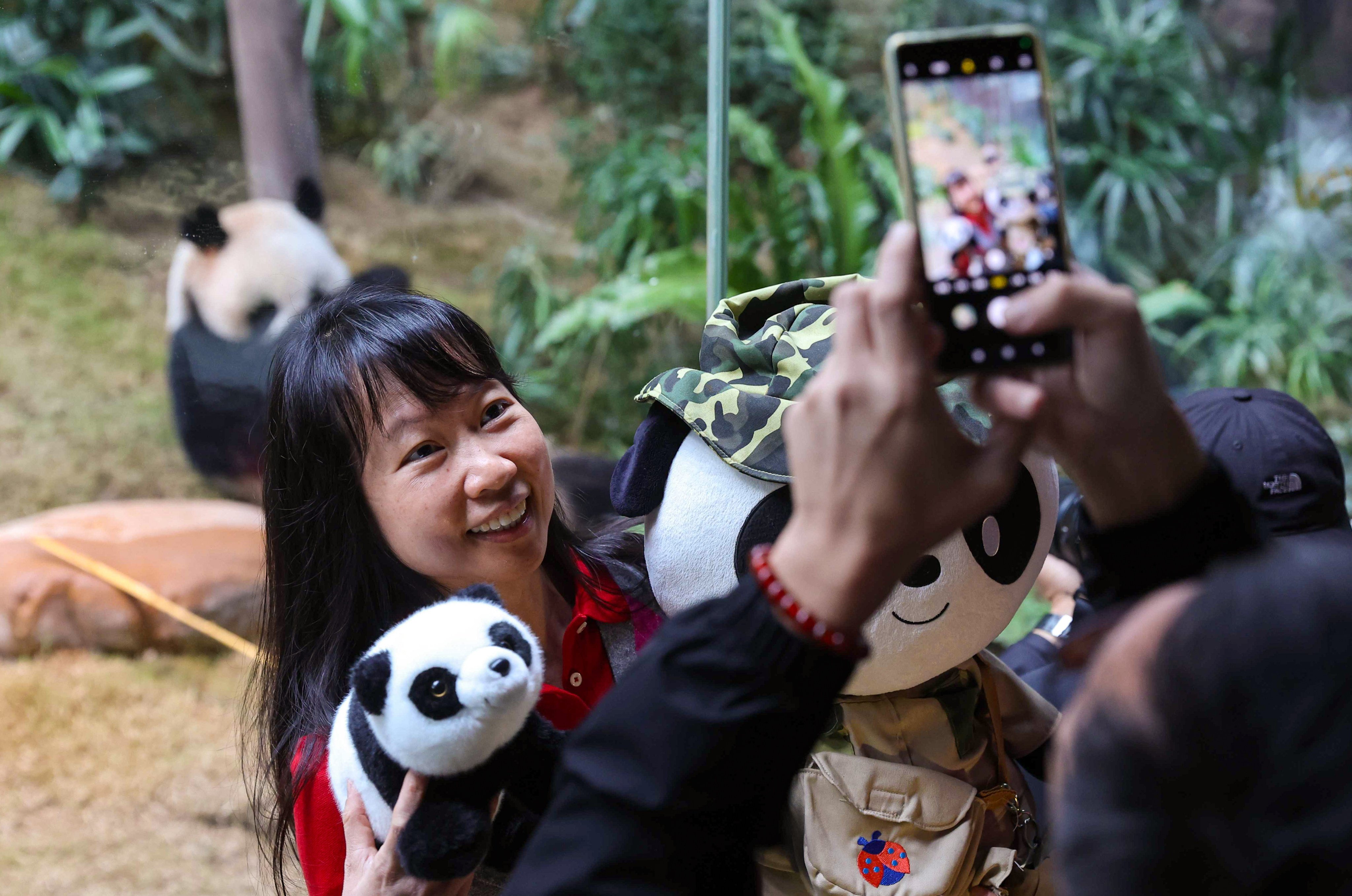 Fans brought along plushies and other panda memorabilia to celebrate the big day. Photo: Edmond So