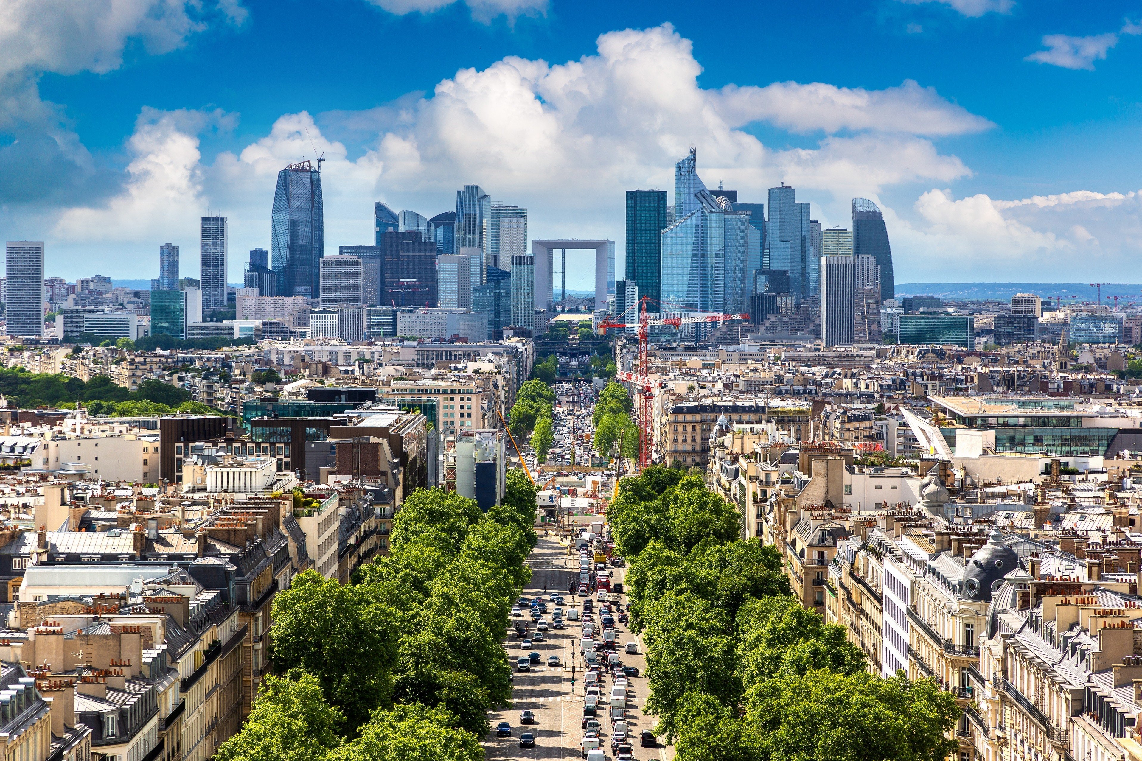 Avenue Charles de Gaulle and the business district of La Defence, seen from Arc de Triomphe in Paris. Photo: Shutterstock