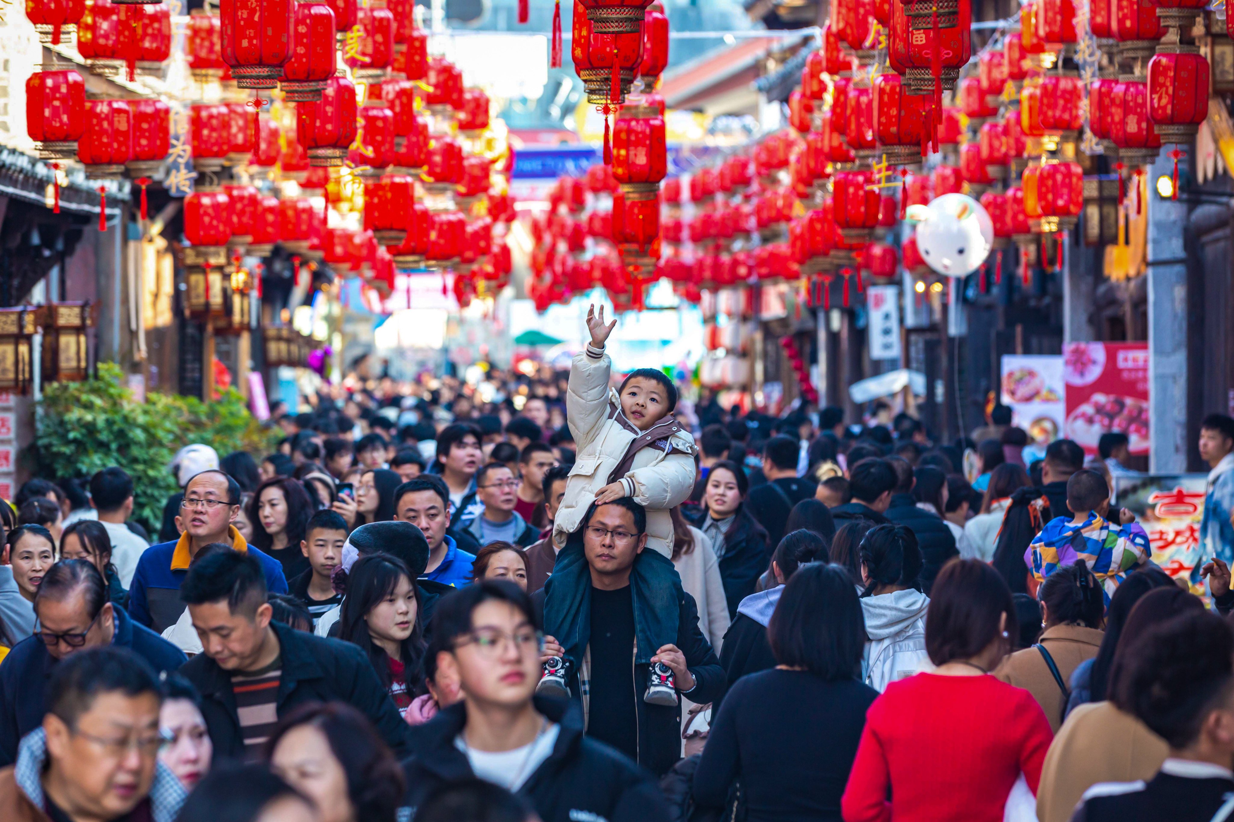 A street in Anshun,  Guizhou province, dressed up for last year’s Spring Festival, China’s biggest annual holiday. Photo: Xinhua 